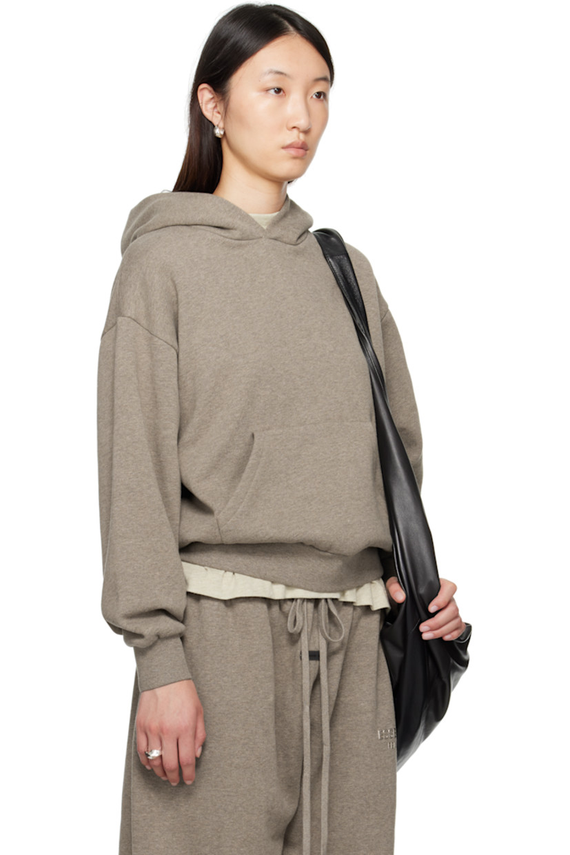Cotton-blend fleece hoodie.

· Rubberized logo patch at hood and cuff
· Kangaroo pocket
· Rib-knit hem and cuffs
· Dropped shoulders
· Reflective logo bonded at back

Supplier color: Homestead heather