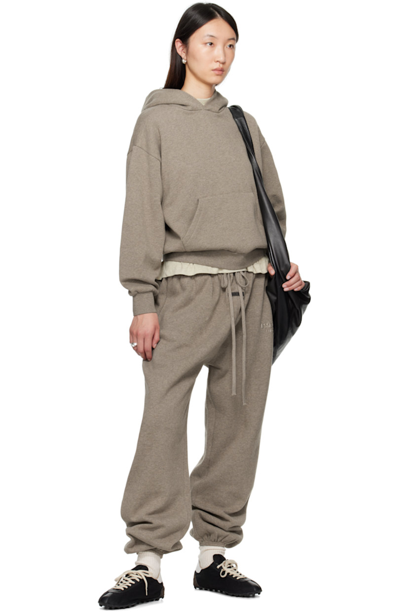 Cotton-blend fleece hoodie.

· Rubberized logo patch at hood and cuff
· Kangaroo pocket
· Rib-knit hem and cuffs
· Dropped shoulders
· Reflective logo bonded at back

Supplier color: Homestead heather