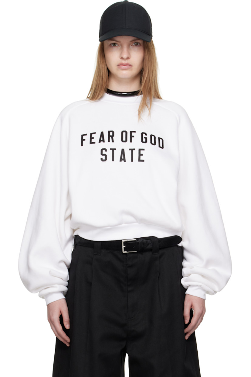 Cotton-blend fleece sweatshirt. 

· Rib-knit crewneck, hem, and cuffs
· Logo appliqués at front 
· Raglan bishop sleeves 
· Rubber logo patch at back collar 

Supplier color: Bright white