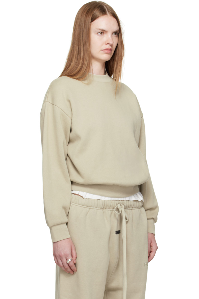 Cotton-blend fleece sweatshirt. 

· Rib-knit crewneck, hem, and cuffs
· Dropped shoulders
· Rubber logo patch at cuff and back collar 
· Bonded logo at back 

Supplier color: Abbey stone