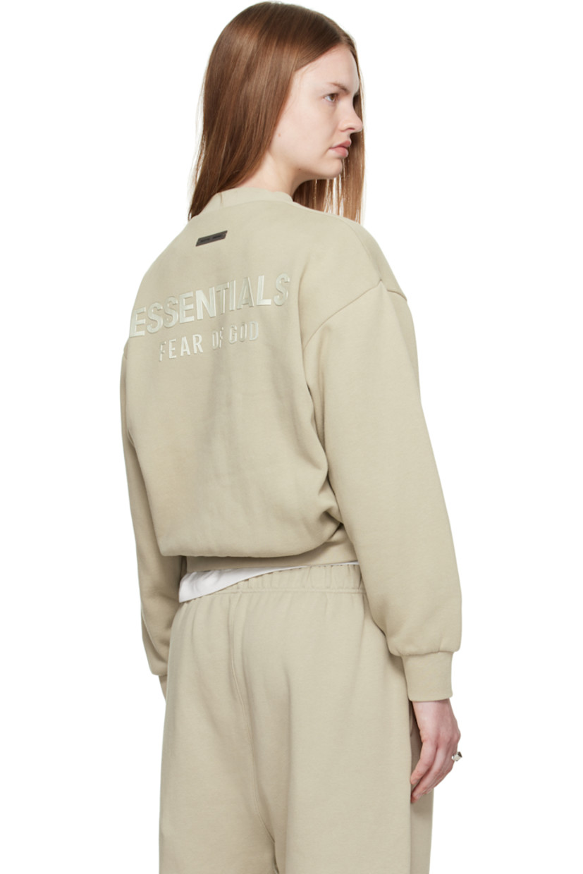 Cotton-blend fleece sweatshirt. 

· Rib-knit crewneck, hem, and cuffs
· Dropped shoulders
· Rubber logo patch at cuff and back collar 
· Bonded logo at back 

Supplier color: Abbey stone