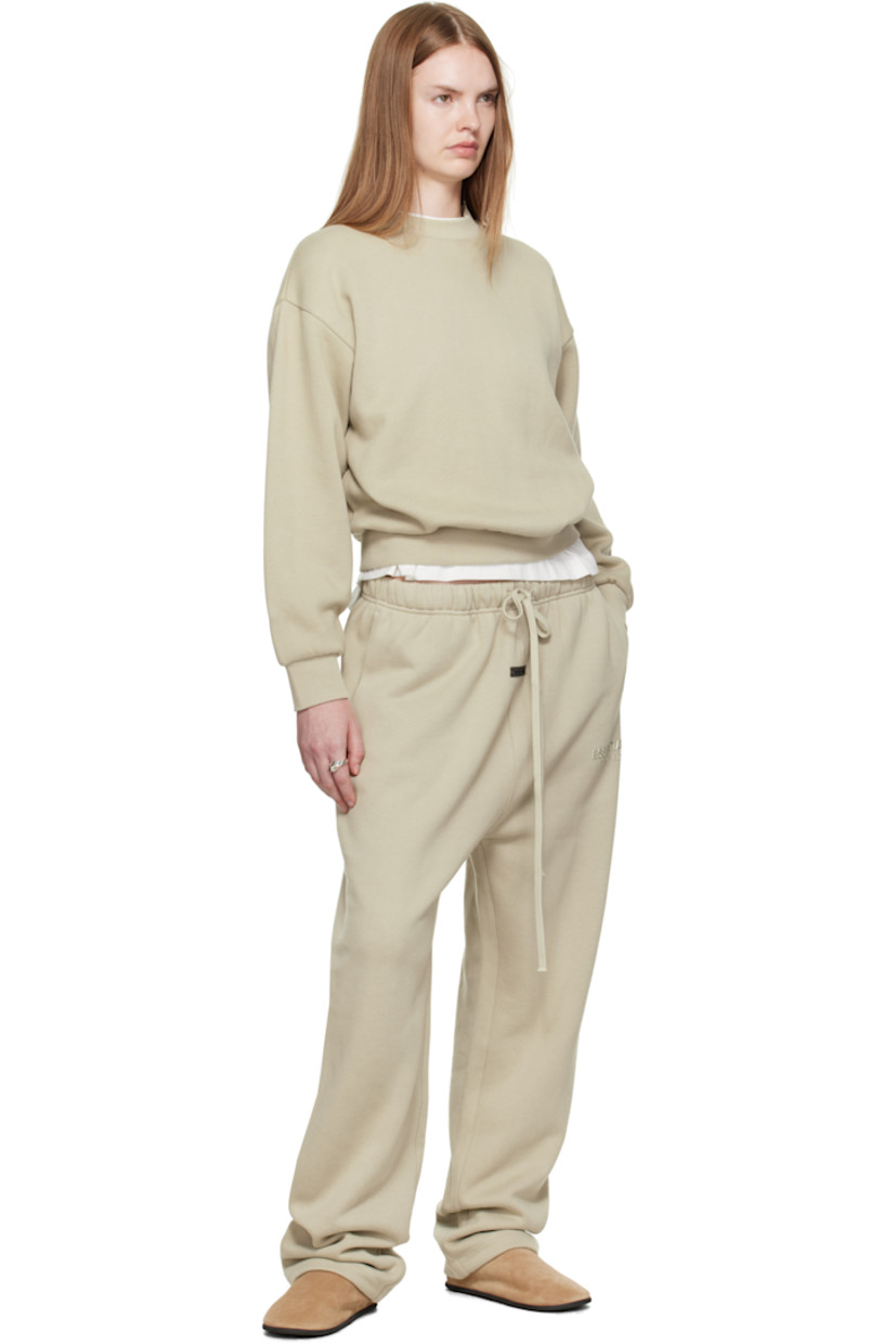 Cotton-blend fleece sweatshirt. 

· Rib-knit crewneck, hem, and cuffs
· Dropped shoulders
· Rubber logo patch at cuff and back collar 
· Bonded logo at back 

Supplier color: Abbey stone