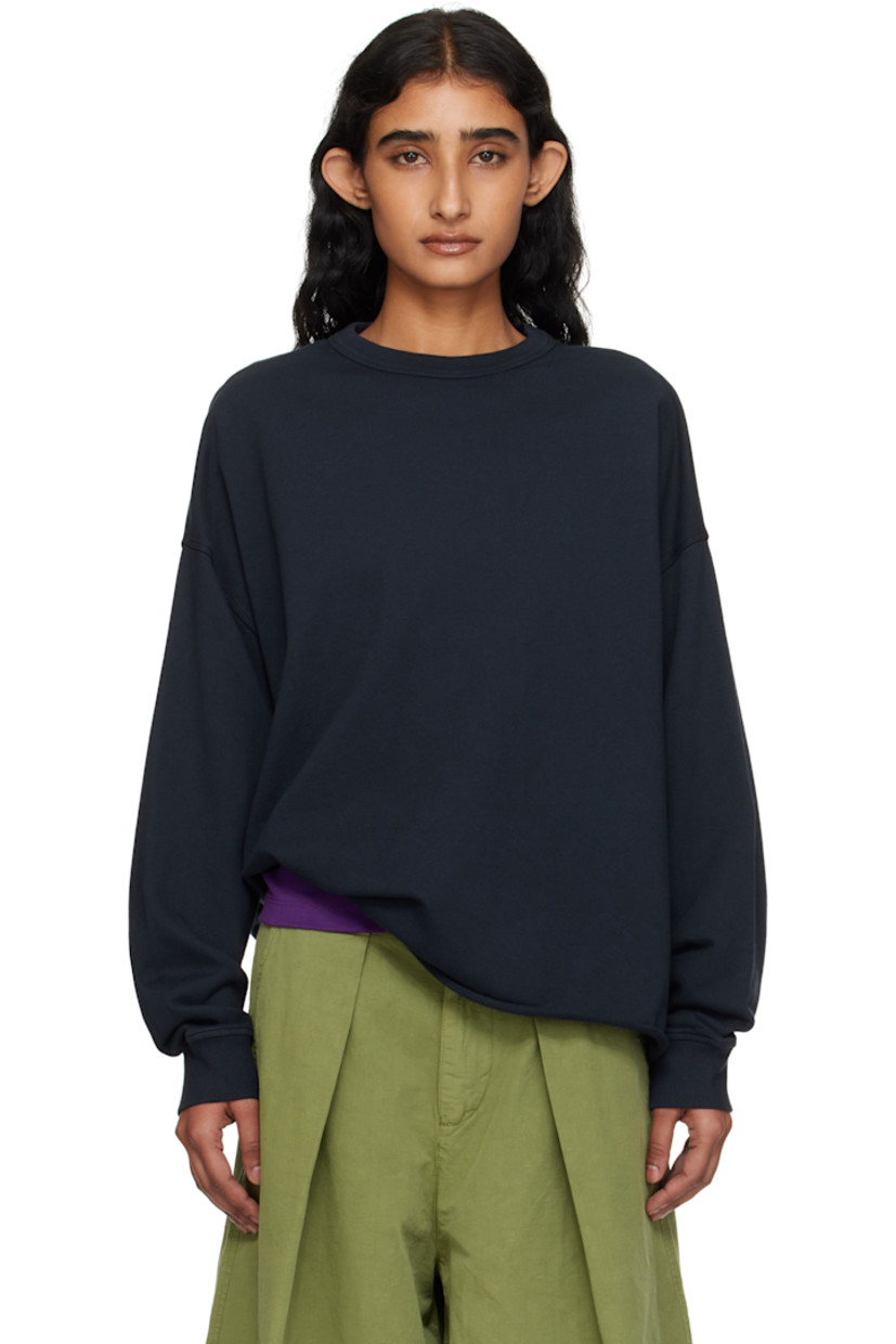 Organic cotton French terry sweatshirt.

· Oversized
· Rib-knit crewneck and cuffs
· Rolled edge at hem
· Dropped shoulders

Supplier color: Navy