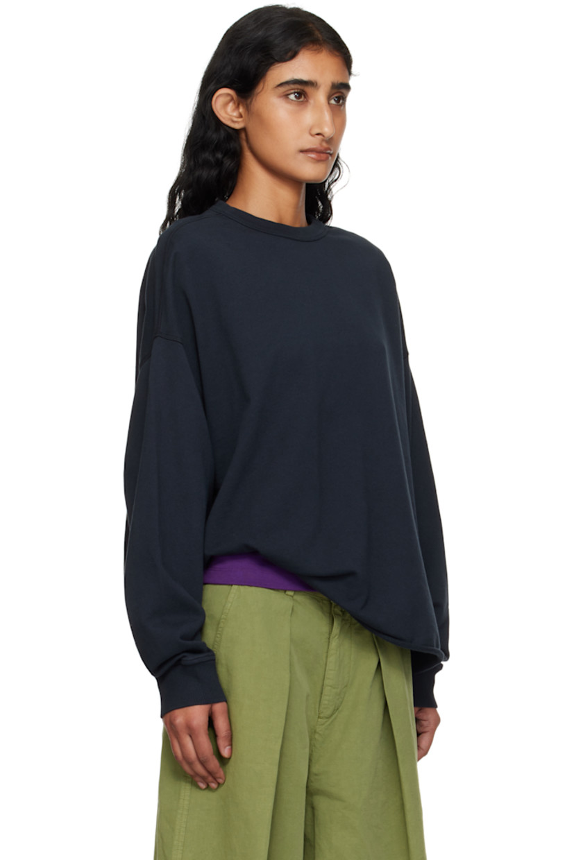 Organic cotton French terry sweatshirt.

· Oversized
· Rib-knit crewneck and cuffs
· Rolled edge at hem
· Dropped shoulders

Supplier color: Navy