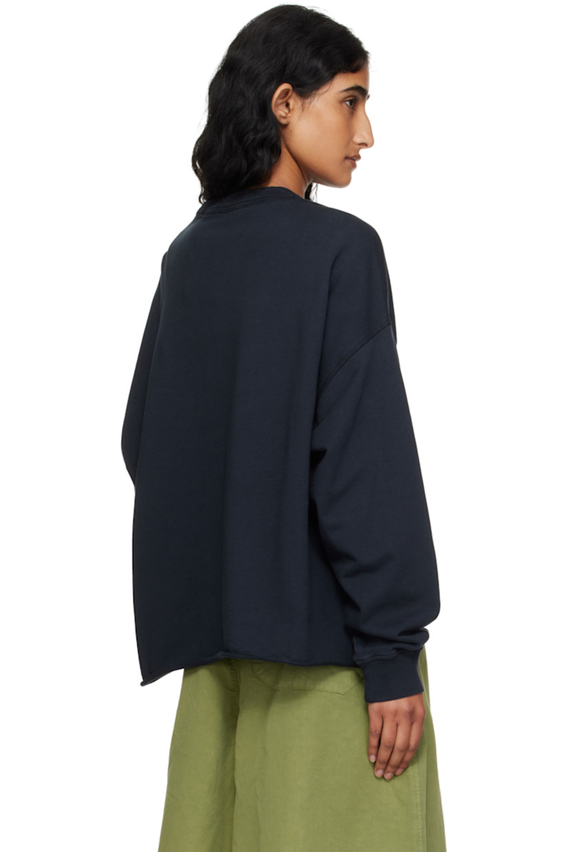 Organic cotton French terry sweatshirt.

· Oversized
· Rib-knit crewneck and cuffs
· Rolled edge at hem
· Dropped shoulders

Supplier color: Navy