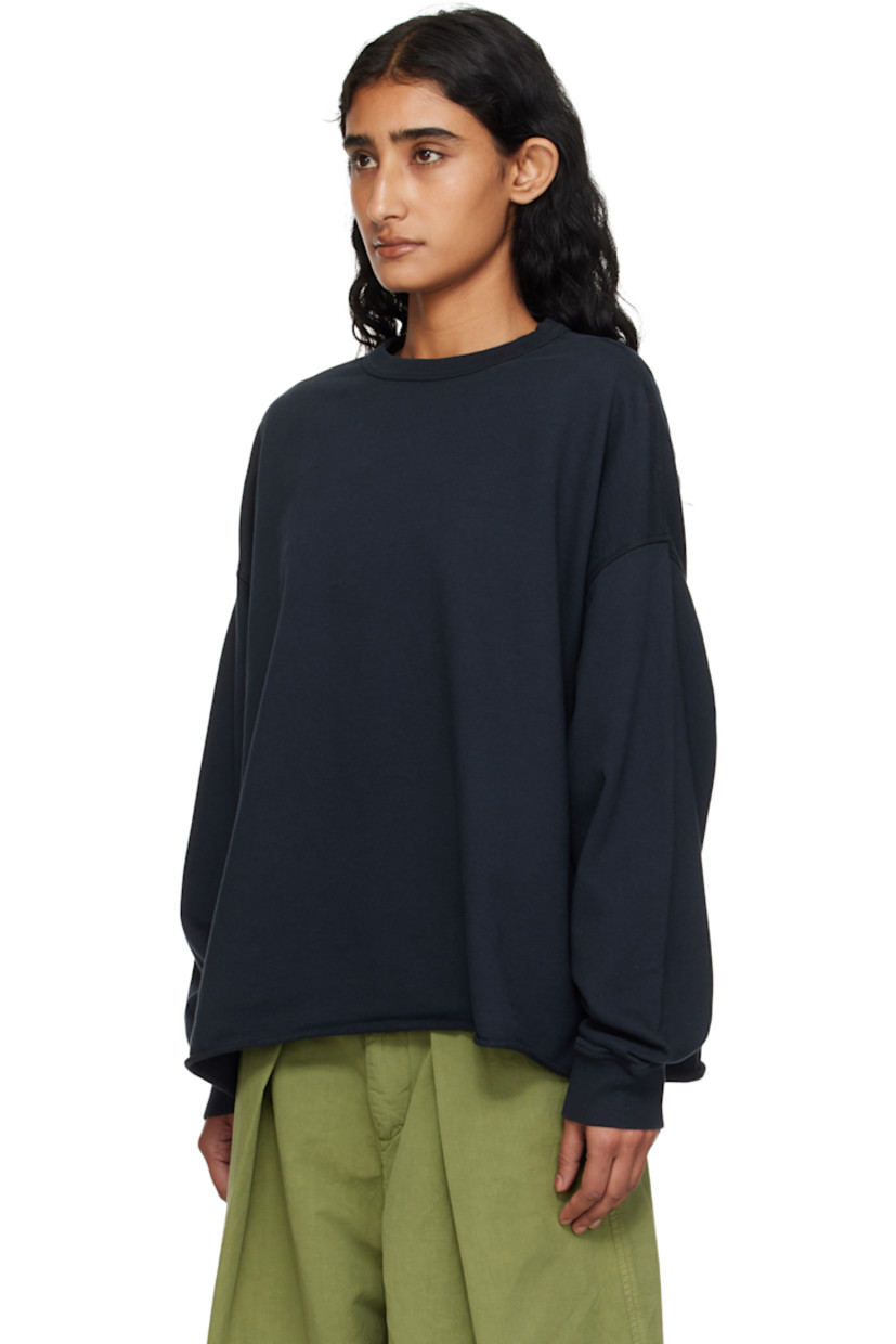 Organic cotton French terry sweatshirt.

· Oversized
· Rib-knit crewneck and cuffs
· Rolled edge at hem
· Dropped shoulders

Supplier color: Navy