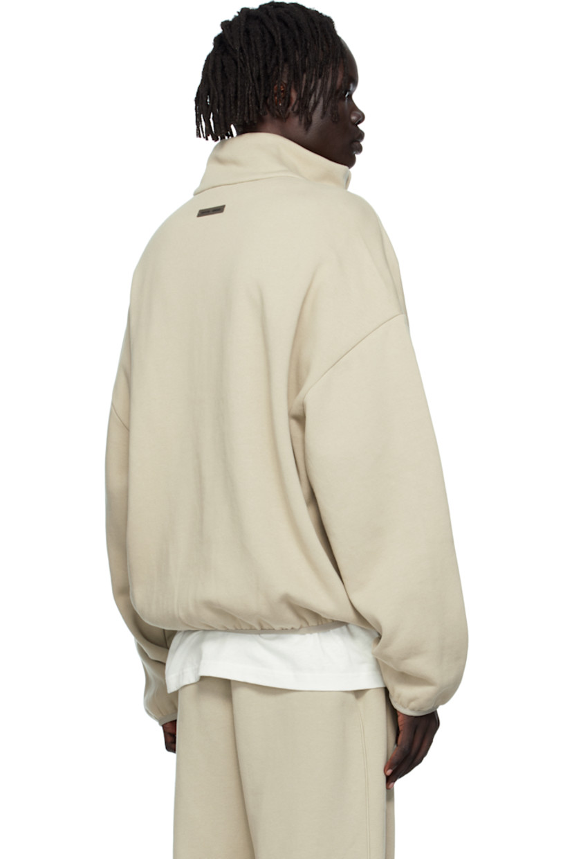 Cotton-blend fleece track jacket.

· Stand collar
· Two-way zip closure
· Logo embroidered at chest
· Seam pockets at waist
· Elasticized hem and cuffs
· Piping at sleeves
· Rubber logo patch at back collar

Supplier color: Abbey stone/Tonal piping
