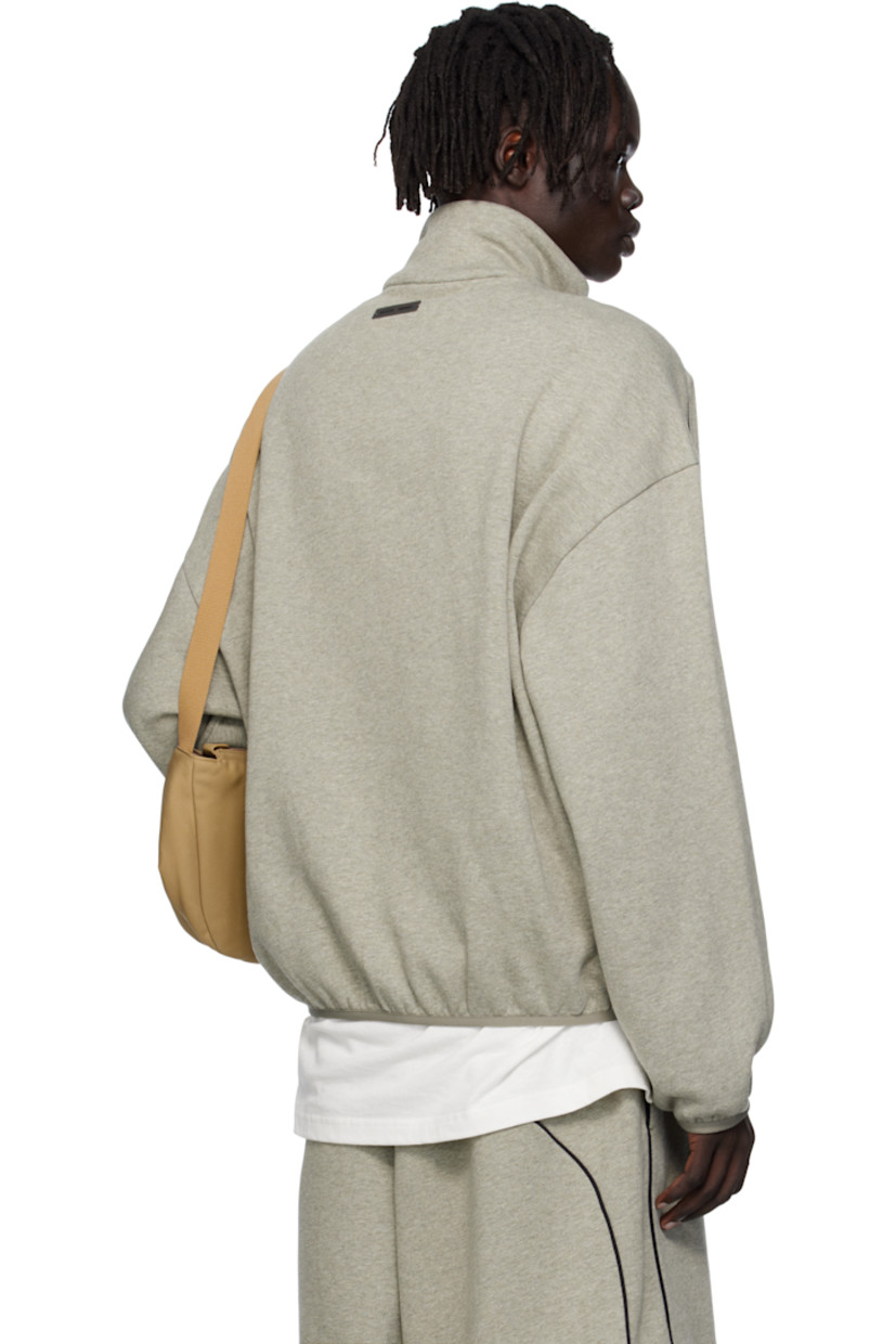 Cotton-blend fleece track jacket.

· Stand collar
· Two-way zip closure
· Logo embroidered at chest
· Seam pockets at waist
· Elasticized hem and cuffs
· Piping at sleeves
· Rubber logo patch at back collar

Supplier color: Concrete heather/Black piping