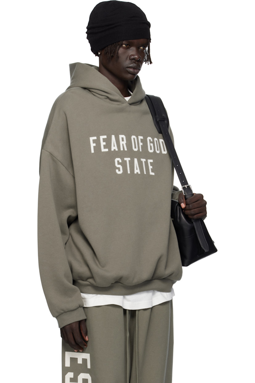 Cotton-blend fleece hoodie.

· Rubber logo patch at hood
· Logo appliqués at front
· Seam pockets at waist
· Rib-knit hem and cuffs
· Dropped shoulders

Supplier color: Moss