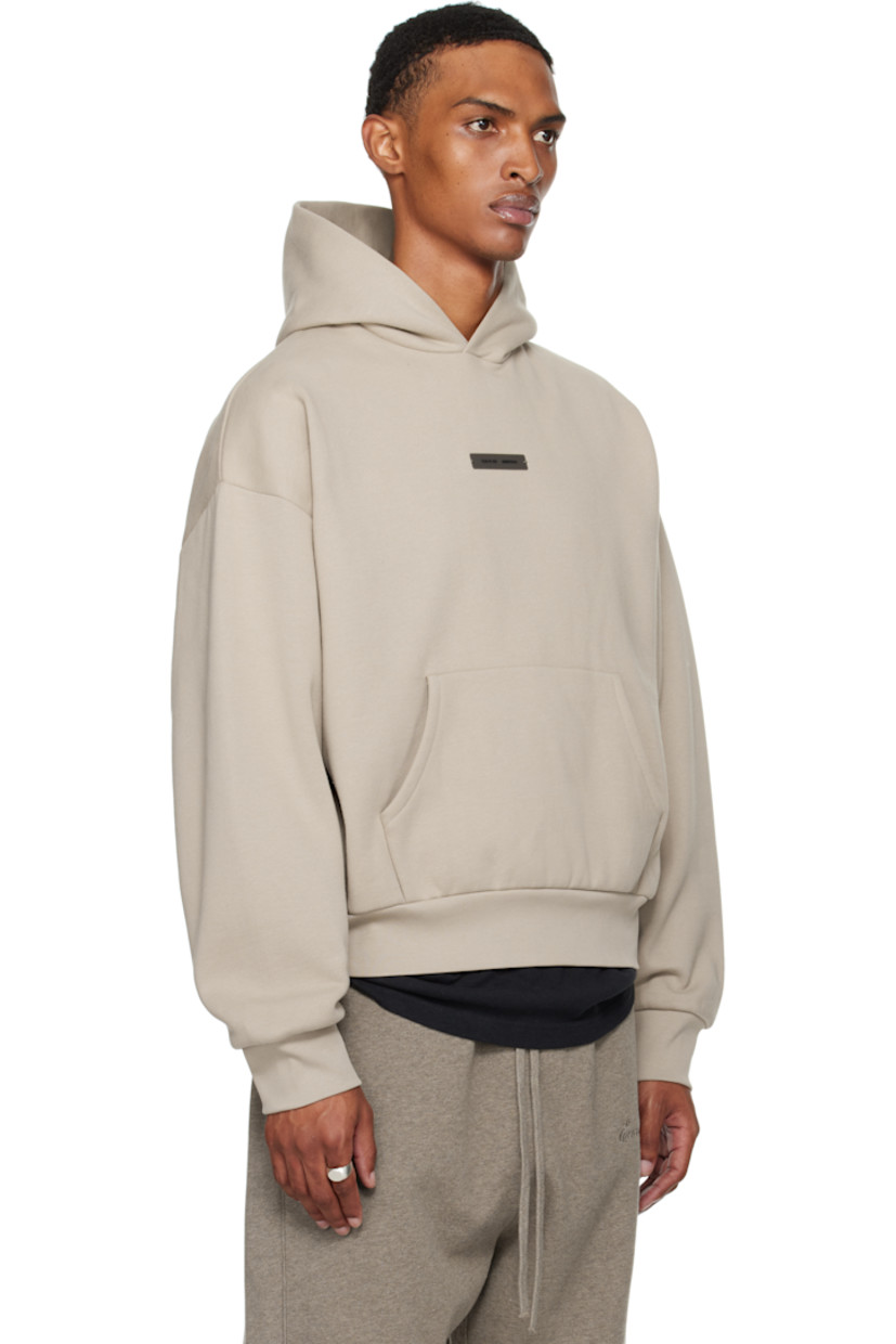 Cotton-blend fleece hoodie.

· Logo patch at hood and chest
· Kangaroo pocket
· Rib-knit hem and cuffs
· Dropped shoulders
· Reflective logo bonded at back

Supplier color: Timber