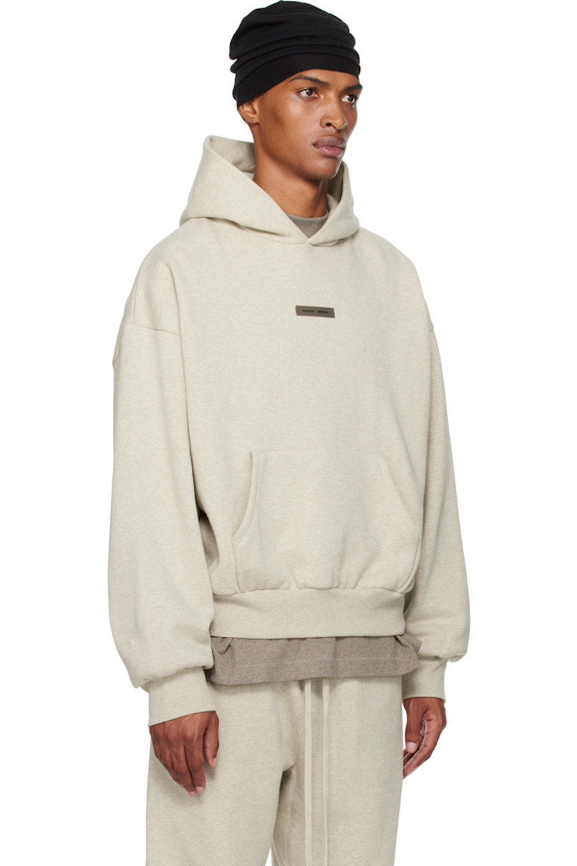 Cotton-blend fleece hoodie.

· Logo patch at hood and chest
· Kangaroo pocket
· Rib-knit hem and cuffs
· Dropped shoulders
· Reflective logo bonded at back

Supplier color: Heather stone