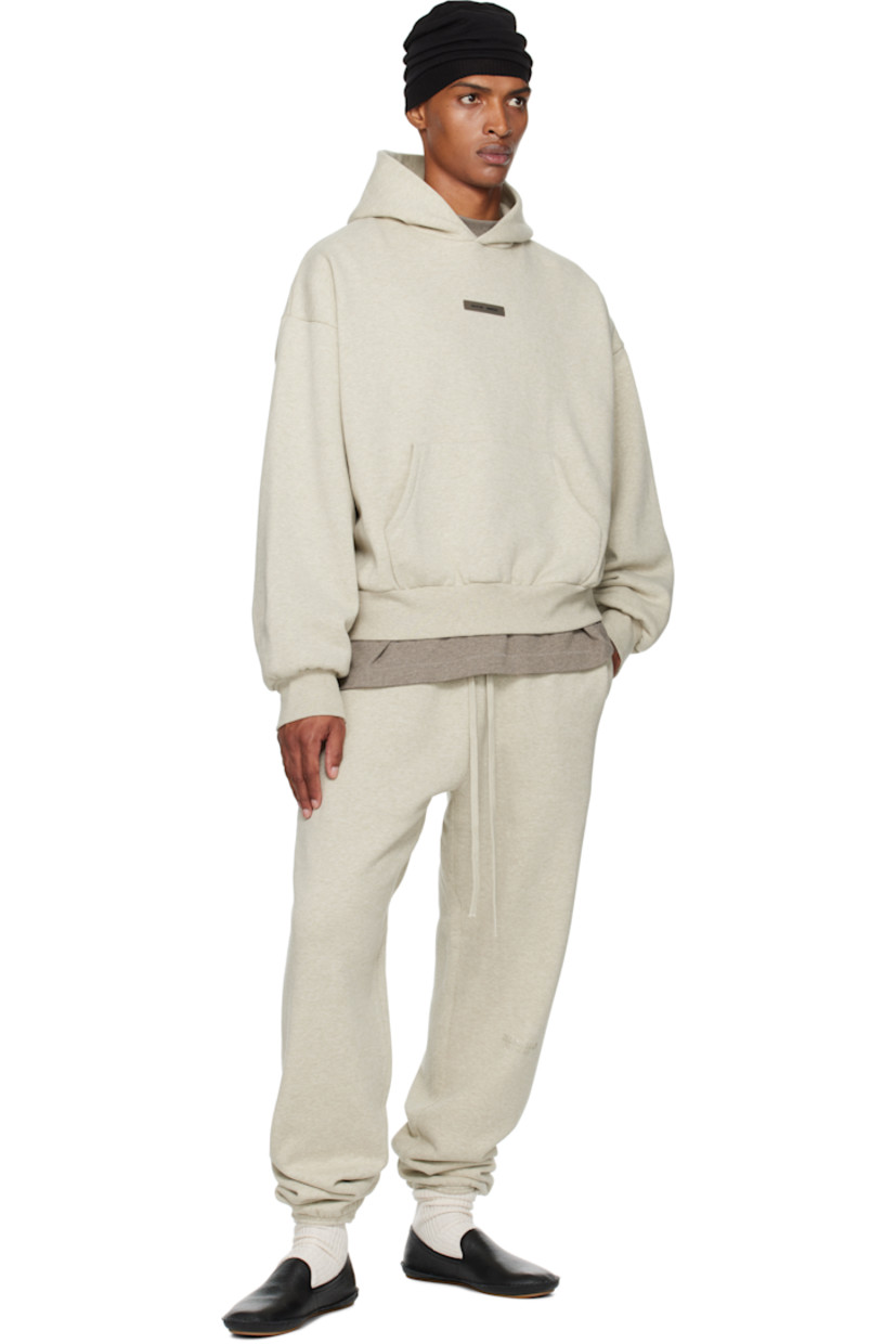 Cotton-blend fleece hoodie.

· Logo patch at hood and chest
· Kangaroo pocket
· Rib-knit hem and cuffs
· Dropped shoulders
· Reflective logo bonded at back

Supplier color: Heather stone