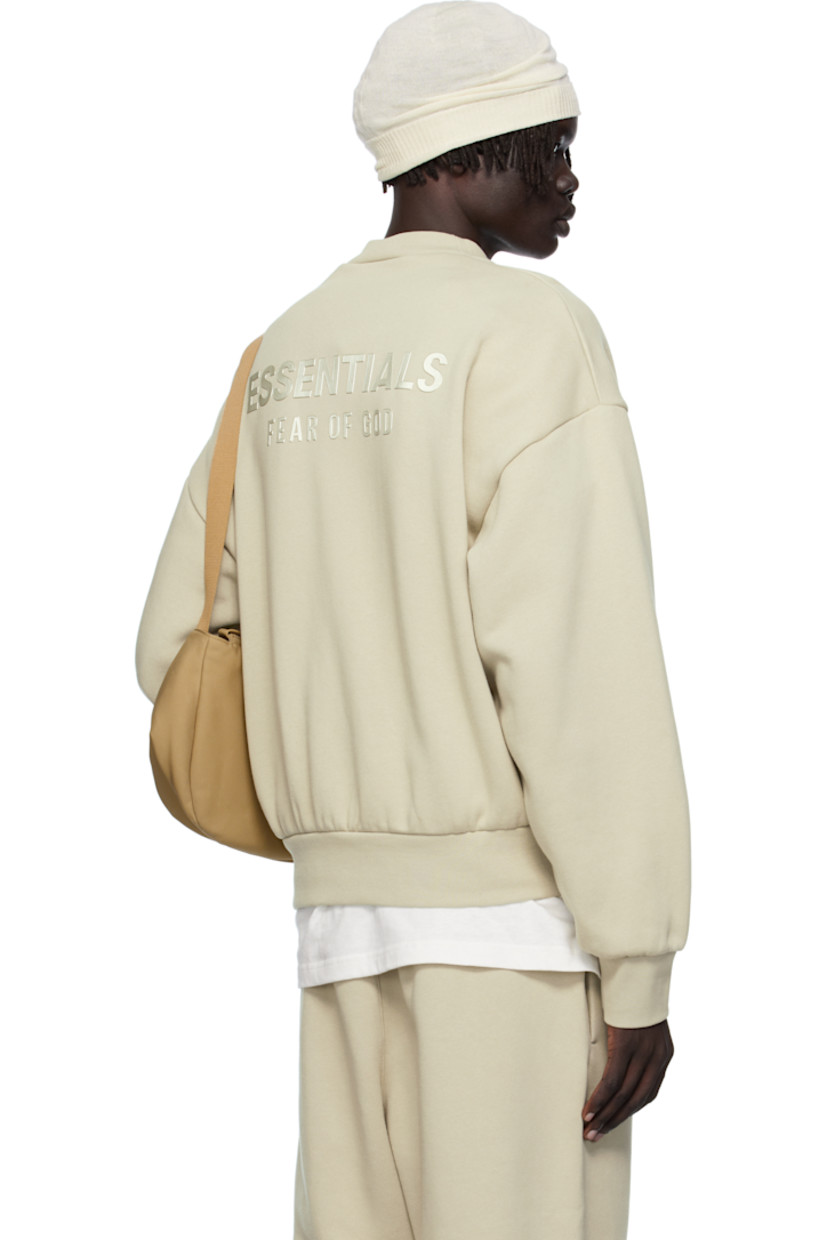 Cotton-blend fleece sweatshirt.

· Rib-knit crewneck, hem, and cuffs
· Dropped shoulders
· Rubber logo patch at cuff
· Logo bonded at back

Supplier color: Abbey stone