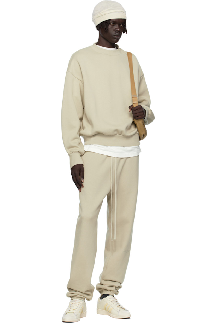 Cotton-blend fleece sweatshirt.

· Rib-knit crewneck, hem, and cuffs
· Dropped shoulders
· Rubber logo patch at cuff
· Logo bonded at back

Supplier color: Abbey stone