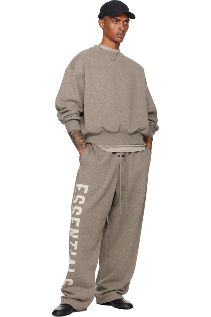 Cotton-blend fleece sweatshirt.

· Rib-knit crewneck, hem, and cuffs
· Dropped shoulders
· Logo patch at cuff
· Reflective logo bonded at back

Supplier color: Homestead heather