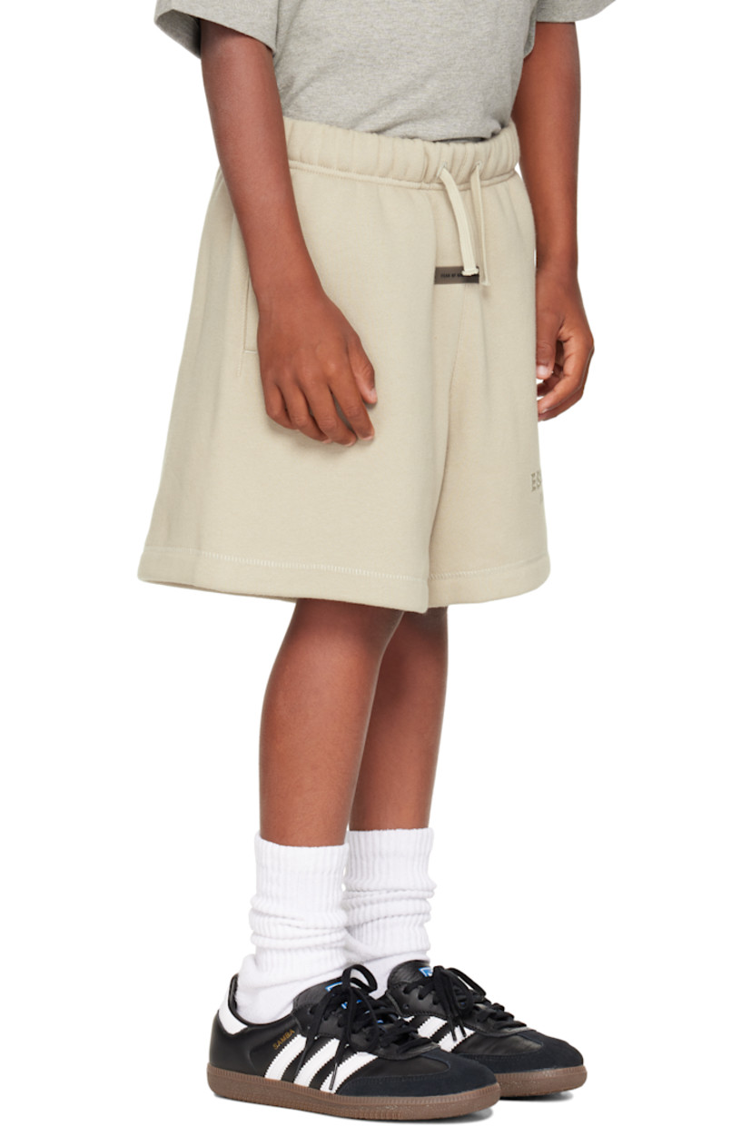 Cotton-blend fleece shorts.

· Drawstring at elasticized waistband
· Two-pocket styling
· Rubber logo patch at front
· Logo bonded at front cuff

Supplier color: Abbey stone

Model measures 50.5" / 128.3 cm tall and wears size 8Y.

Size: child's height 
2/3Y: 36-41" / 91.5-104 cm 
4/5Y: 41-44.5" / 104-113 cm 
6/7Y: 44.5-48.5" / 113-123 cm 
8Y: 48.5-53" / 123-134.5 cm 
10Y: 53-58" / 134.5-147.5 cm 
12Y: 58-62" / 147.3-157.5 cm 
14/16Y: 63-67" / 157.5-170.2 cm