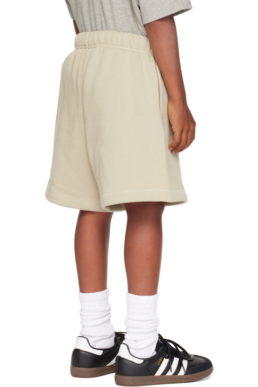 Cotton-blend fleece shorts.

· Drawstring at elasticized waistband
· Two-pocket styling
· Rubber logo patch at front
· Logo bonded at front cuff

Supplier color: Abbey stone

Model measures 50.5" / 128.3 cm tall and wears size 8Y.

Size: child's height 
2/3Y: 36-41" / 91.5-104 cm 
4/5Y: 41-44.5" / 104-113 cm 
6/7Y: 44.5-48.5" / 113-123 cm 
8Y: 48.5-53" / 123-134.5 cm 
10Y: 53-58" / 134.5-147.5 cm 
12Y: 58-62" / 147.3-157.5 cm 
14/16Y: 63-67" / 157.5-170.2 cm