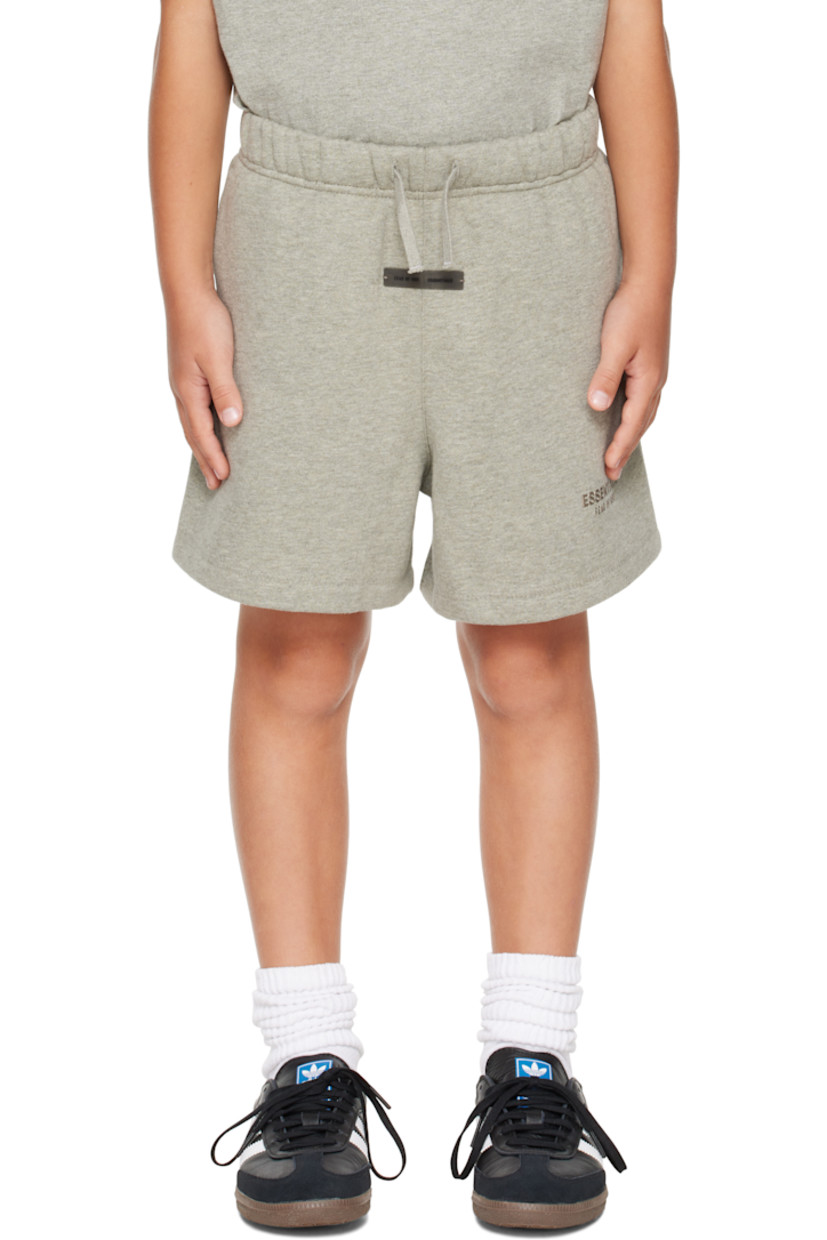 Cotton-blend fleece shorts.

· Drawstring at elasticized waistband
· Two-pocket styling
· Rubber logo patch at front
· Logo bonded at front cuff

Supplier color: Concrete heather

Model measures 49.5" / 125.7 cm tall and wears size 6/7Y.

Size: child's height 
2/3Y: 36-41" / 91.5-104 cm 
4/5Y: 41-44.5" / 104-113 cm 
6/7Y: 44.5-48.5" / 113-123 cm 
8Y: 48.5-53" / 123-134.5 cm 
10Y: 53-58" / 134.5-147.5 cm 
12Y: 58-62" / 147.3-157.5 cm 
14/16Y: 63-67" / 157.5-170.2 cm
