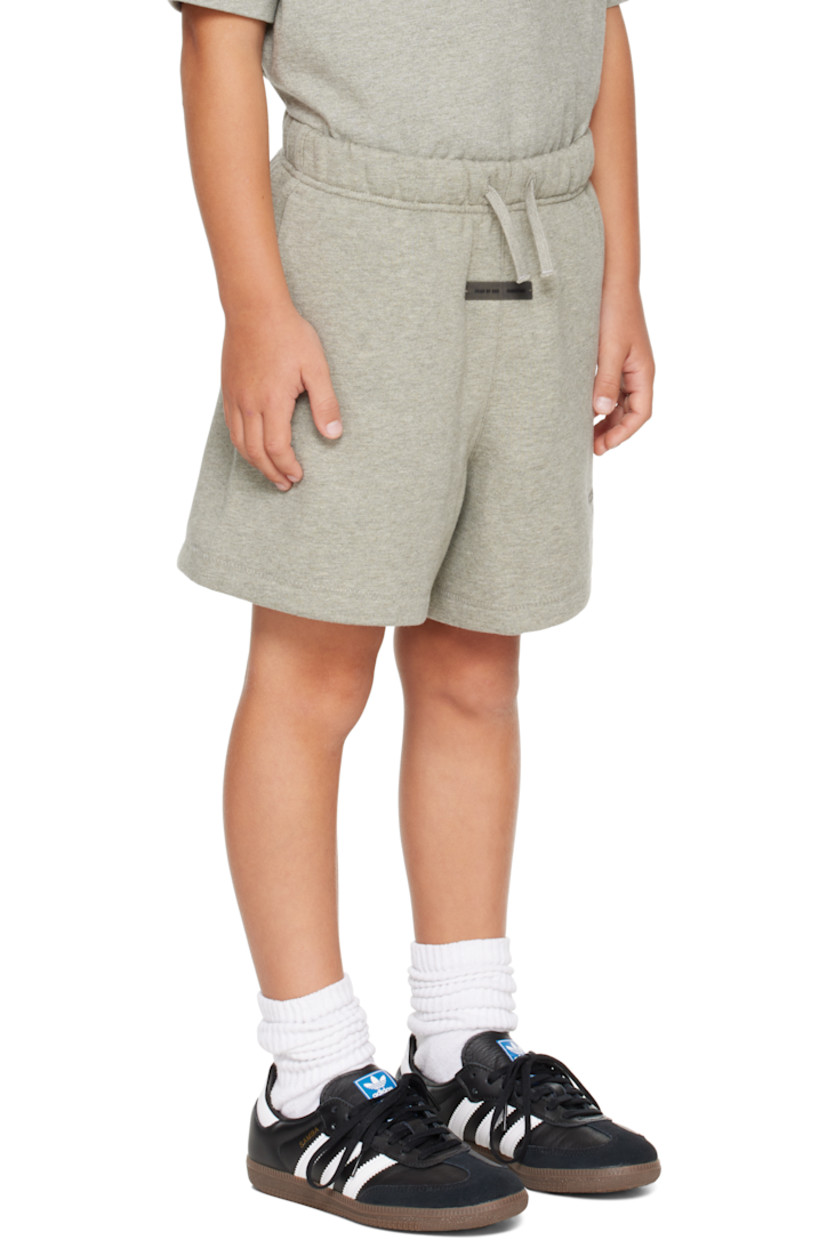 Cotton-blend fleece shorts.

· Drawstring at elasticized waistband
· Two-pocket styling
· Rubber logo patch at front
· Logo bonded at front cuff

Supplier color: Concrete heather

Model measures 49.5" / 125.7 cm tall and wears size 6/7Y.

Size: child's height 
2/3Y: 36-41" / 91.5-104 cm 
4/5Y: 41-44.5" / 104-113 cm 
6/7Y: 44.5-48.5" / 113-123 cm 
8Y: 48.5-53" / 123-134.5 cm 
10Y: 53-58" / 134.5-147.5 cm 
12Y: 58-62" / 147.3-157.5 cm 
14/16Y: 63-67" / 157.5-170.2 cm