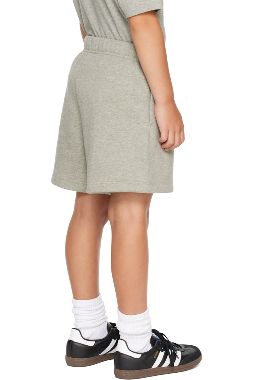 Cotton-blend fleece shorts.

· Drawstring at elasticized waistband
· Two-pocket styling
· Rubber logo patch at front
· Logo bonded at front cuff

Supplier color: Concrete heather

Model measures 49.5" / 125.7 cm tall and wears size 6/7Y.

Size: child's height 
2/3Y: 36-41" / 91.5-104 cm 
4/5Y: 41-44.5" / 104-113 cm 
6/7Y: 44.5-48.5" / 113-123 cm 
8Y: 48.5-53" / 123-134.5 cm 
10Y: 53-58" / 134.5-147.5 cm 
12Y: 58-62" / 147.3-157.5 cm 
14/16Y: 63-67" / 157.5-170.2 cm