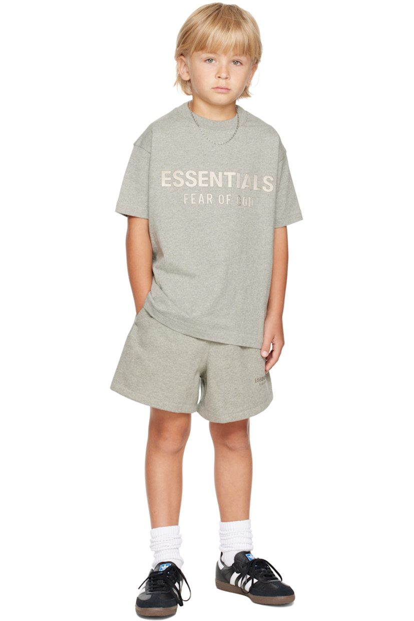 Cotton-blend fleece shorts.

· Drawstring at elasticized waistband
· Two-pocket styling
· Rubber logo patch at front
· Logo bonded at front cuff

Supplier color: Concrete heather

Model measures 49.5" / 125.7 cm tall and wears size 6/7Y.

Size: child's height 
2/3Y: 36-41" / 91.5-104 cm 
4/5Y: 41-44.5" / 104-113 cm 
6/7Y: 44.5-48.5" / 113-123 cm 
8Y: 48.5-53" / 123-134.5 cm 
10Y: 53-58" / 134.5-147.5 cm 
12Y: 58-62" / 147.3-157.5 cm 
14/16Y: 63-67" / 157.5-170.2 cm