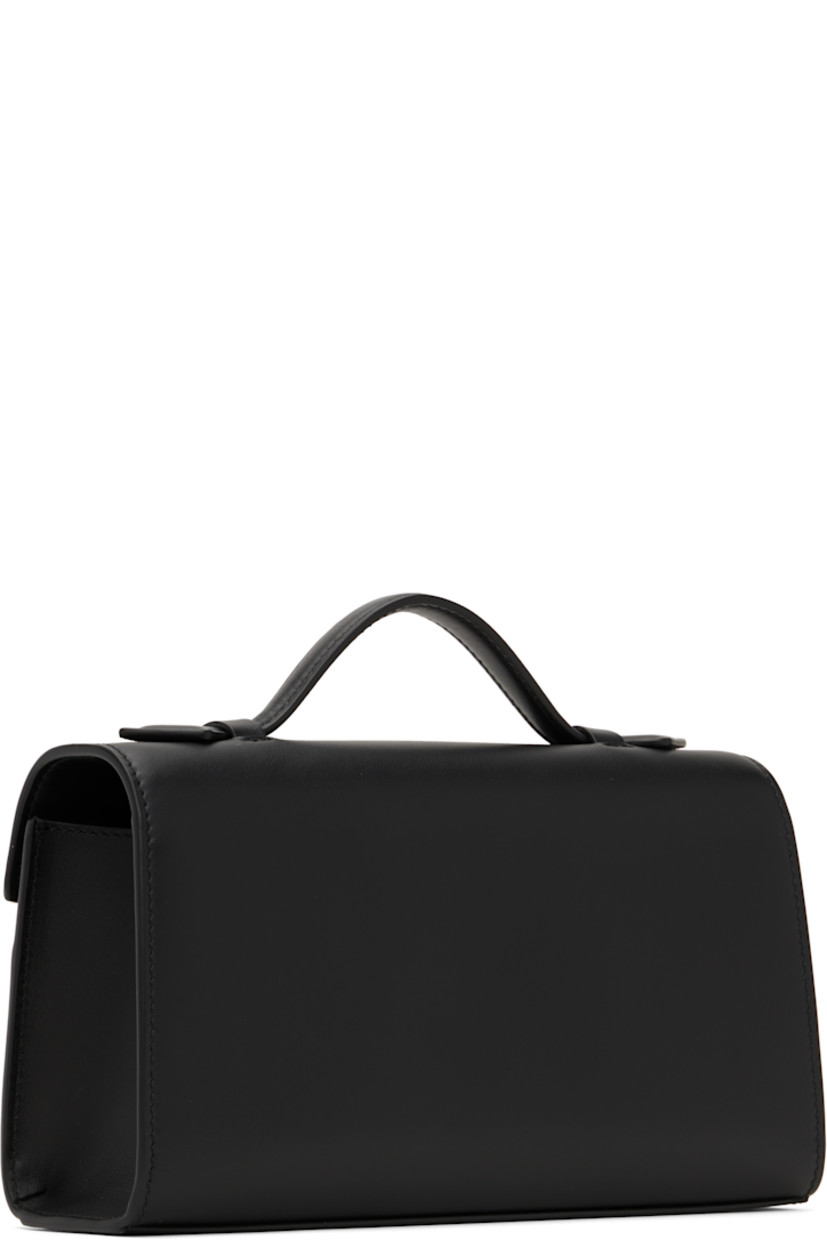 Buffed calfskin top handle bag in black.

· Fixed carry handle
· Turn-lock flap
· Card slot at interior
· Buffed calfskin lining
· Gold-tone hardware
· H5.5" x W8.5" x D3"

Supplier color: Black leather