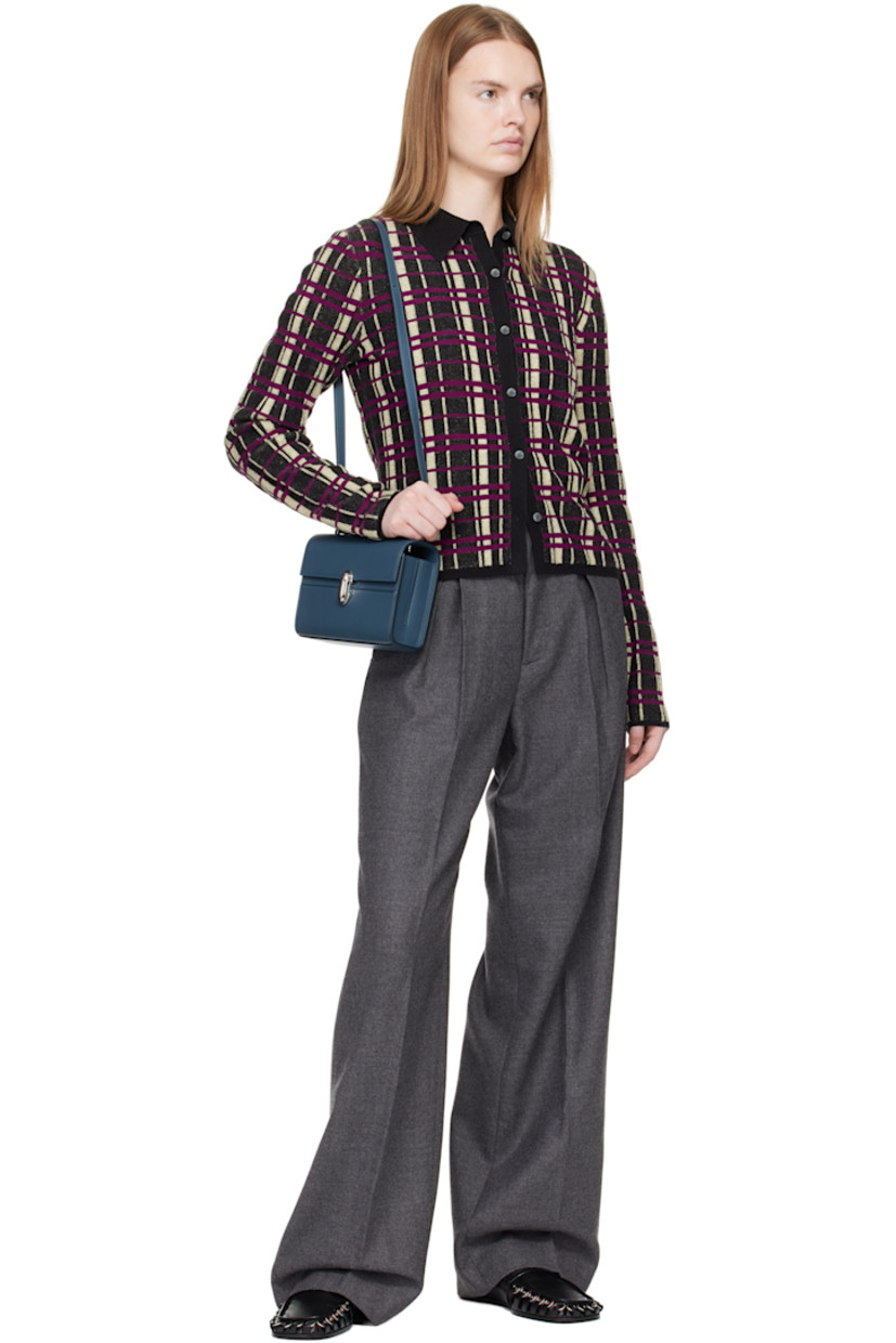 Rigid buffed calfskin shoulder bag.

· Adjustable crossbody strap
· Shorten to shoulder strap with interior studs
· Foldover flap with turn-lock clasp
· Two-compartment leather interior
· Two patch pockets
· H5.5" x W7.5" x D2.75"

Supplier color: Ocean