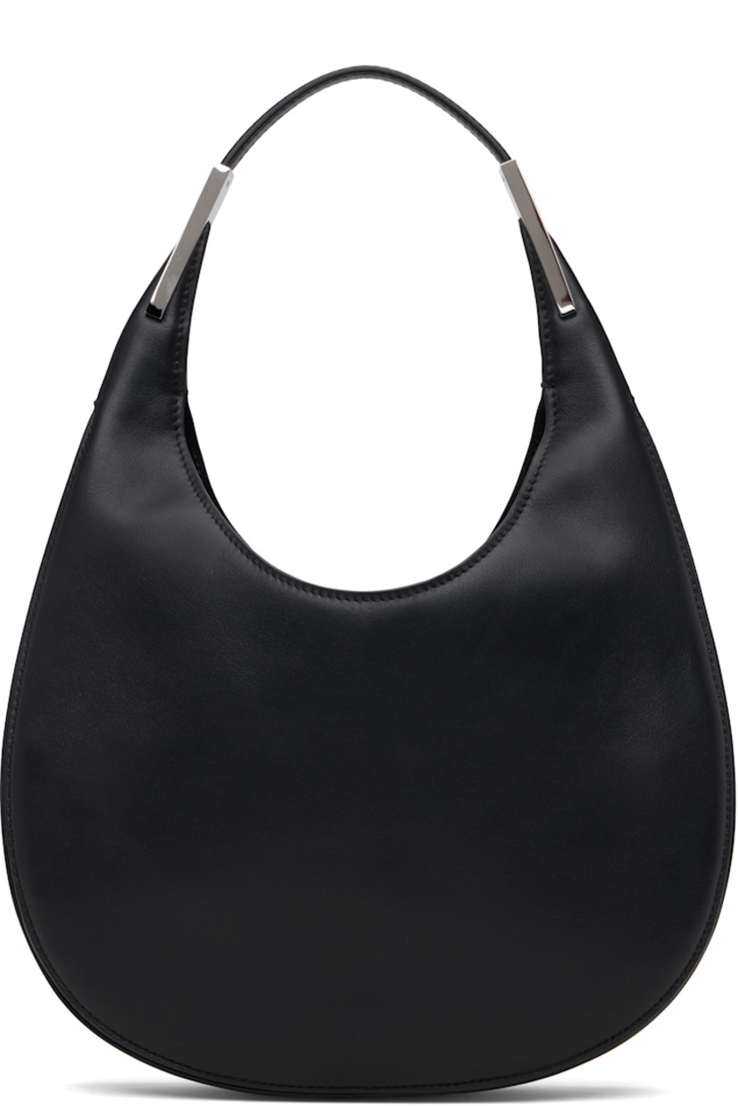 Grained calfskin shoulder bag. 

· Integrated shoulder strap with hardware
· Logo stamp at back face
· Self-tie closure at throat
· Suede lining
· H8" x W9.5" x D2"
· Total height: H13"

Supplier color: Black