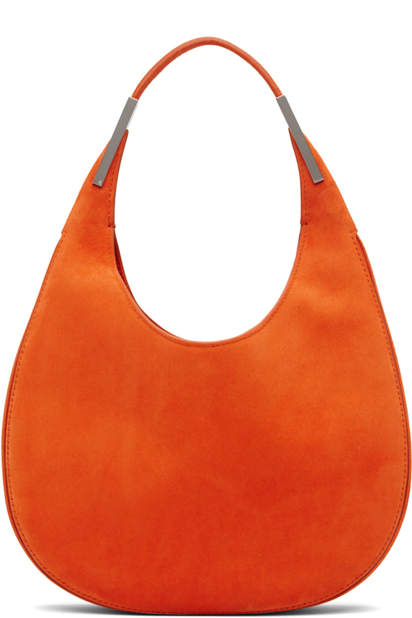 Brushed calfskin suede shoulder bag. 

· Integrated shoulder strap with hardware
· Logo stamp at back face
· Self-tie closure at throat
· Suede lining
· H8" x W9.5" x D2"
· Total height: H13"

Supplier color: Tangerine