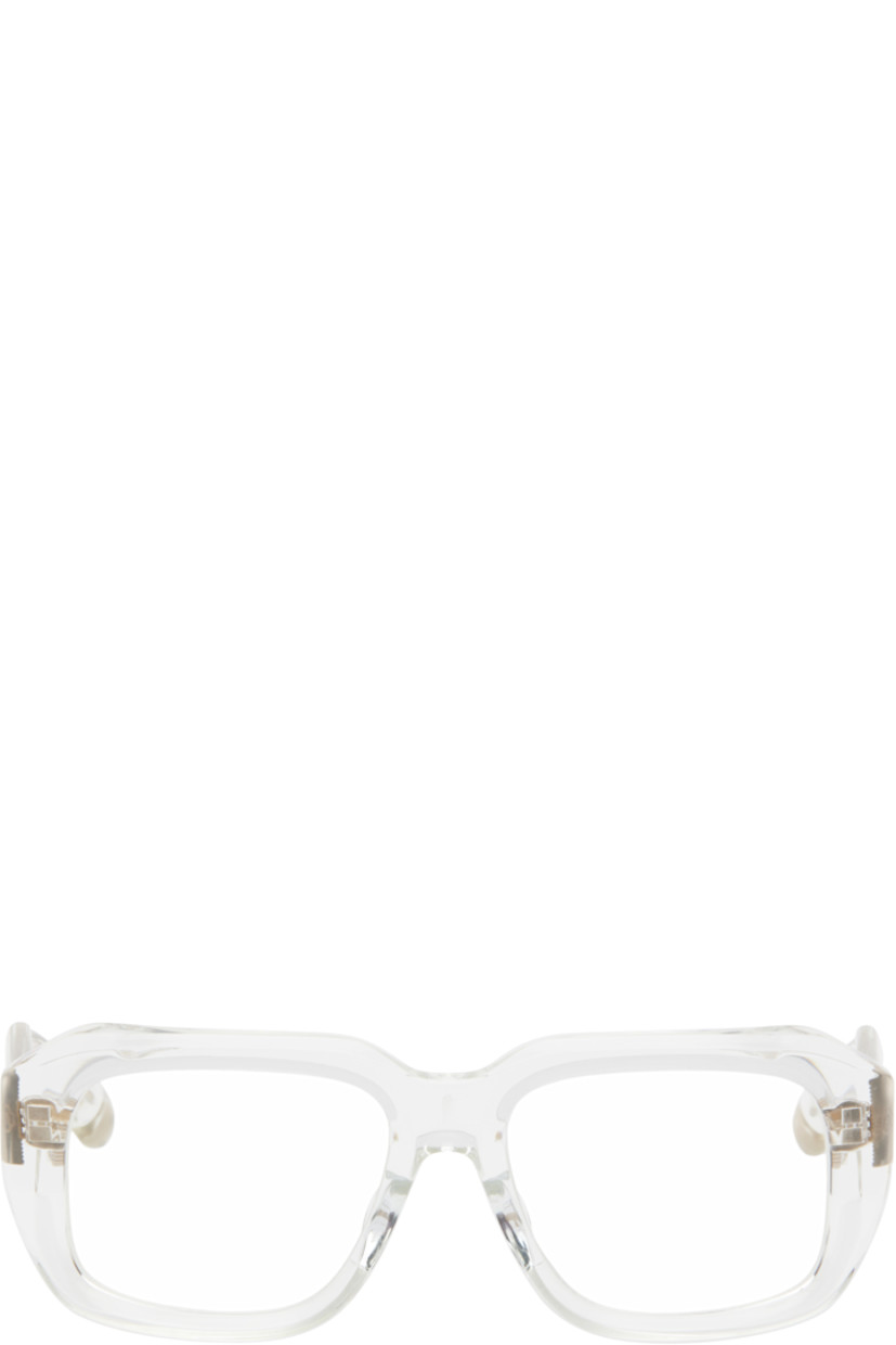 Handcrafted transparent acetate-frame optical glasses. 

· Filigree detailing and logo pattern throughout
· Integrated nose pads
· Exposed core wires
· Includes case
· Size: 54.18 145

Supplier color: Crystal clear