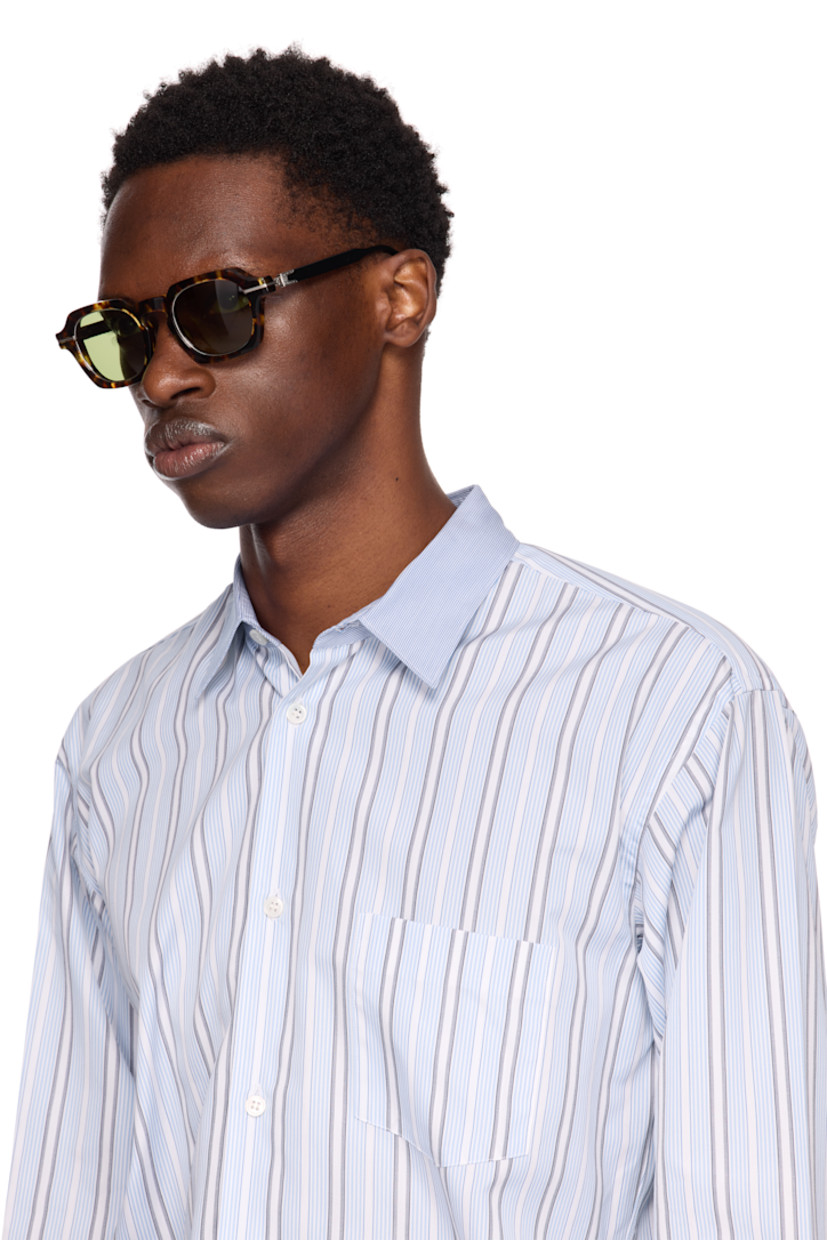 Handcrafted tortoiseshell acetate-frame sunglasses in brown. 

· Filigree detailing and logo pattern throughout
· Green lenses
· 100% UVA/UVB protection 
· Keyhole bridge 
· Integrated nose pads
· Black acetate arms
· Logo plaque at temple tips
· Silver-tone titanium hardware
· Includes case
· Size: 48.23 142

Available exclusively at SSENSE.

Supplier color: Tokyo tortoise/Brushed silver