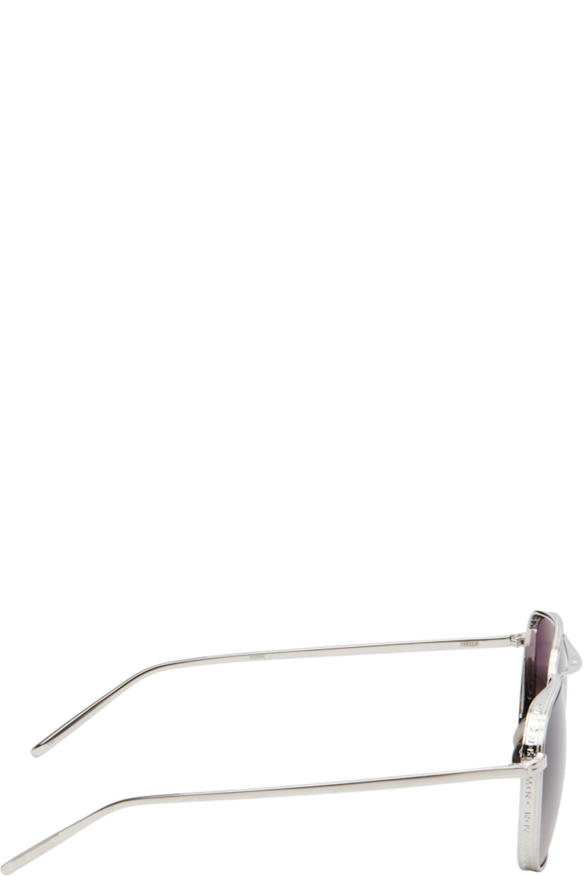 Handcrafted rectangular titanium-frame sunglasses in silver tone.

· Filigree detailing and logo pattern throughout
· Lightweight
· Black gradient lenses
· 100% UVA/UVB protection 
· Top bar
· Adjustable titanium nose pads
· Includes case
· Size: 56.17 140

Supplier color: Palladium white