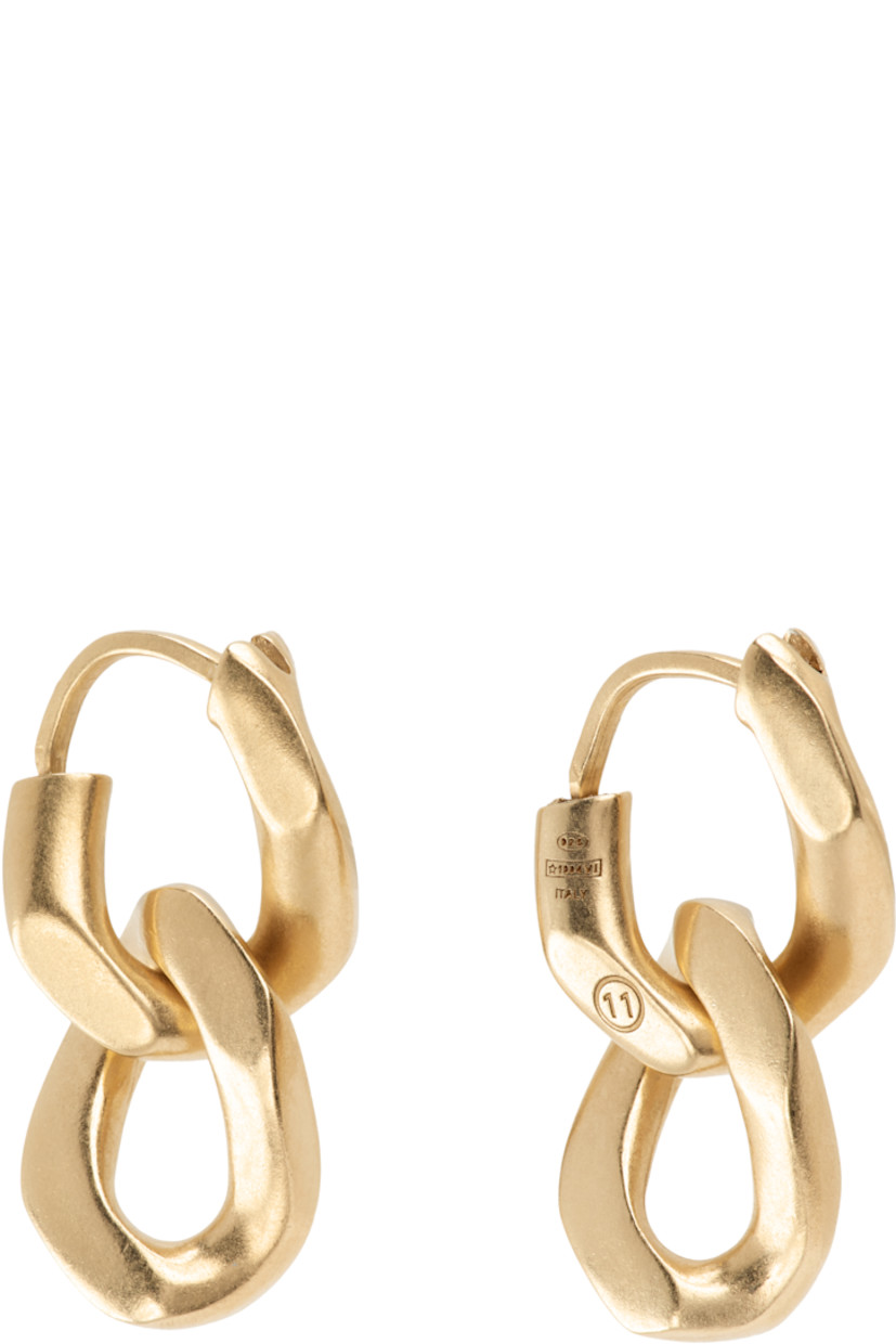 Pair of curb chain drop earrings in gold-tone sterling silver. 

· Hinged-post fastening 
· H1" x W0.5"

Supplier color: Yellow gold plating