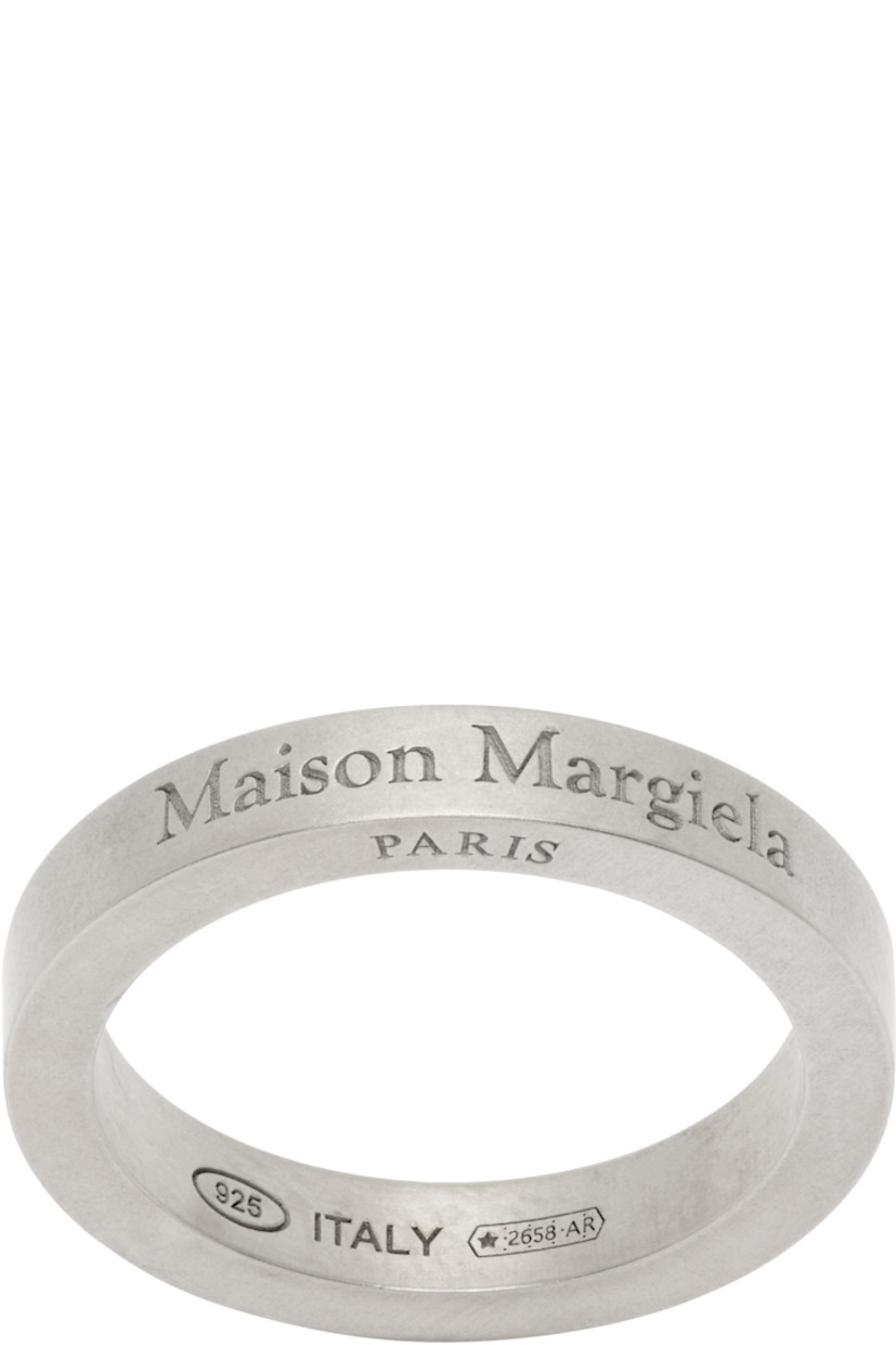 Band ring in sterling silver.

· Logo engraved at face
· Hallmarking at inner band

Supplier color: Palladio buratta
