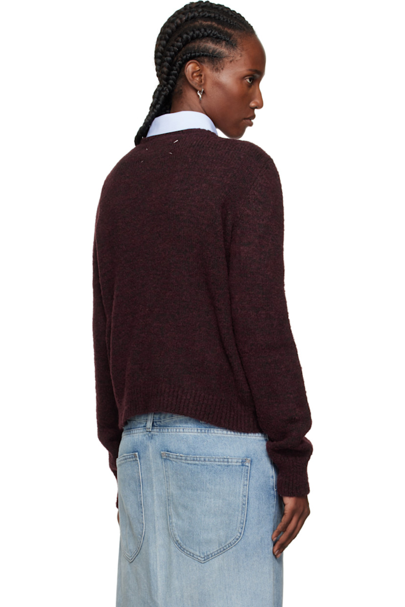 Knit virgin wool-blend sweater.

· Rib-knit crewneck, hem, and cuffs
· White stitching at back collar

Supplier color: Burgundy