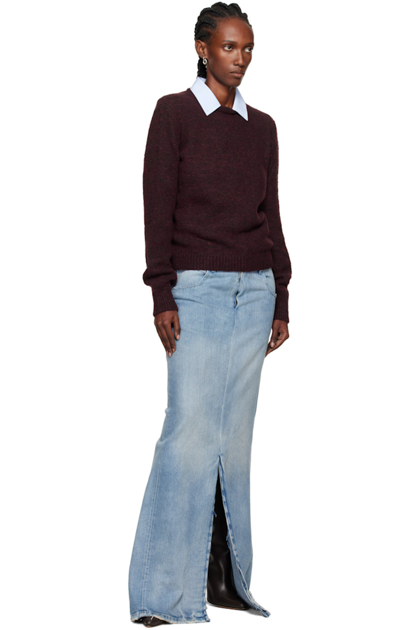 Knit virgin wool-blend sweater.

· Rib-knit crewneck, hem, and cuffs
· White stitching at back collar

Supplier color: Burgundy