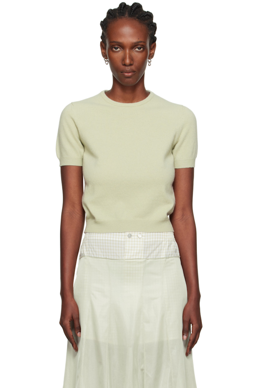 Knit virgin wool sweater.

· Rib-knit crewneck, hem, and cuffs
· White stitching at back collar

Supplier color: Pale green