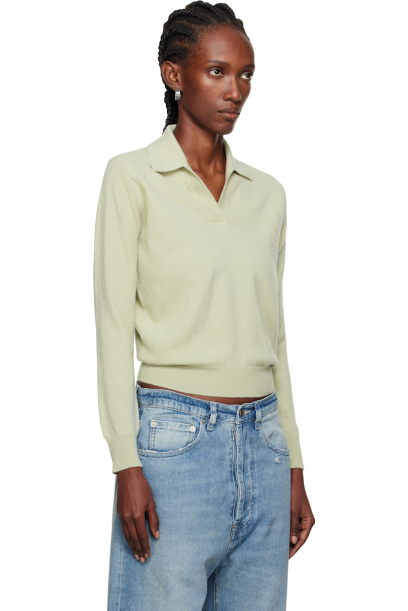Knit virgin wool polo.

· Rib-knit open spread collar, hem, and cuffs
· White stitching at back collar

Supplier color: Pale green