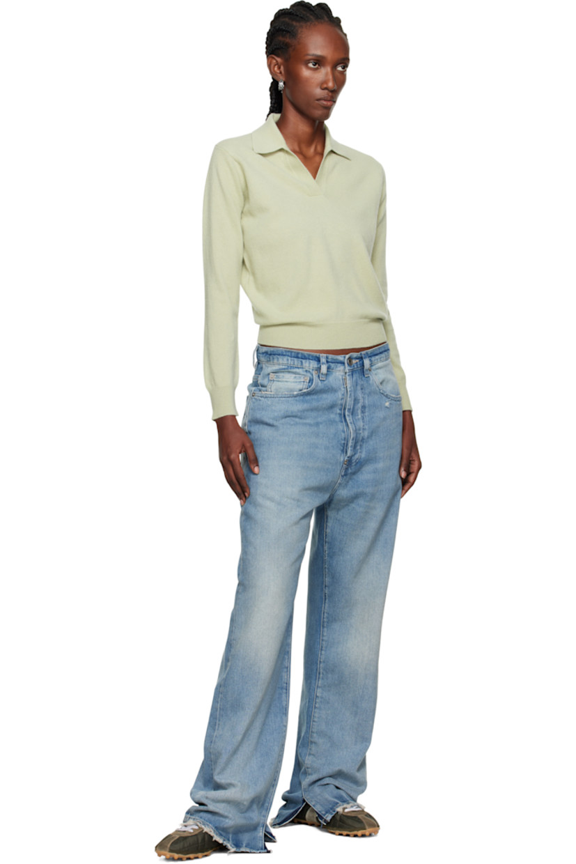 Knit virgin wool polo.

· Rib-knit open spread collar, hem, and cuffs
· White stitching at back collar

Supplier color: Pale green