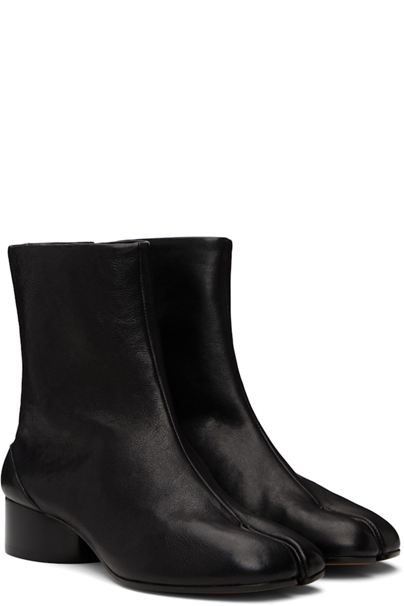 Ankle-high buffed lambskin boots.

· Square cleft toe
· Hook-eye closure at inner side
· White stitching at heel collar
· Stacked cylindrical heel with rubber injection
· Calfskin sole
· Heel: H1.25"

Supplier color: Black