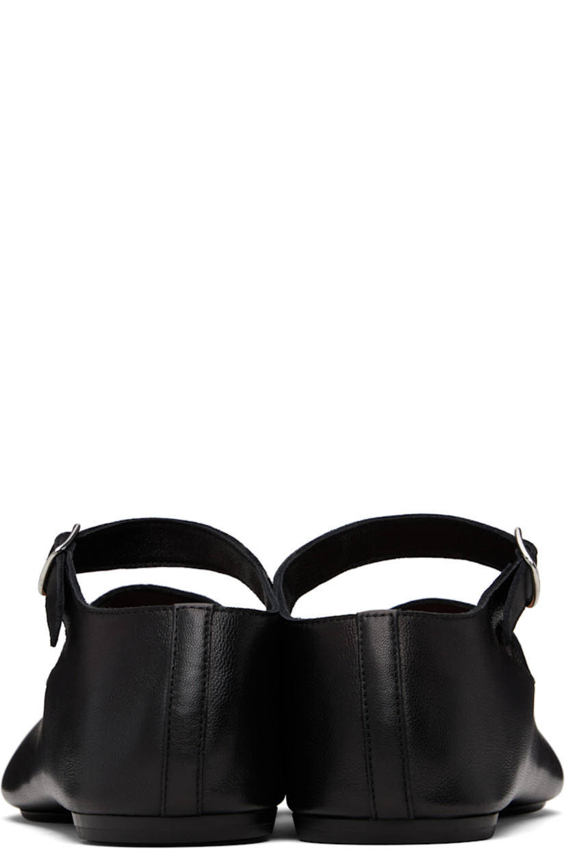 Buffed lambskin Mary Jane-style ballerina flats.

· Square cleft toe
· White stitch at vamp
· Pin-buckle ankle strap
· Calfskin sole with rubber injection

Supplier color: Black