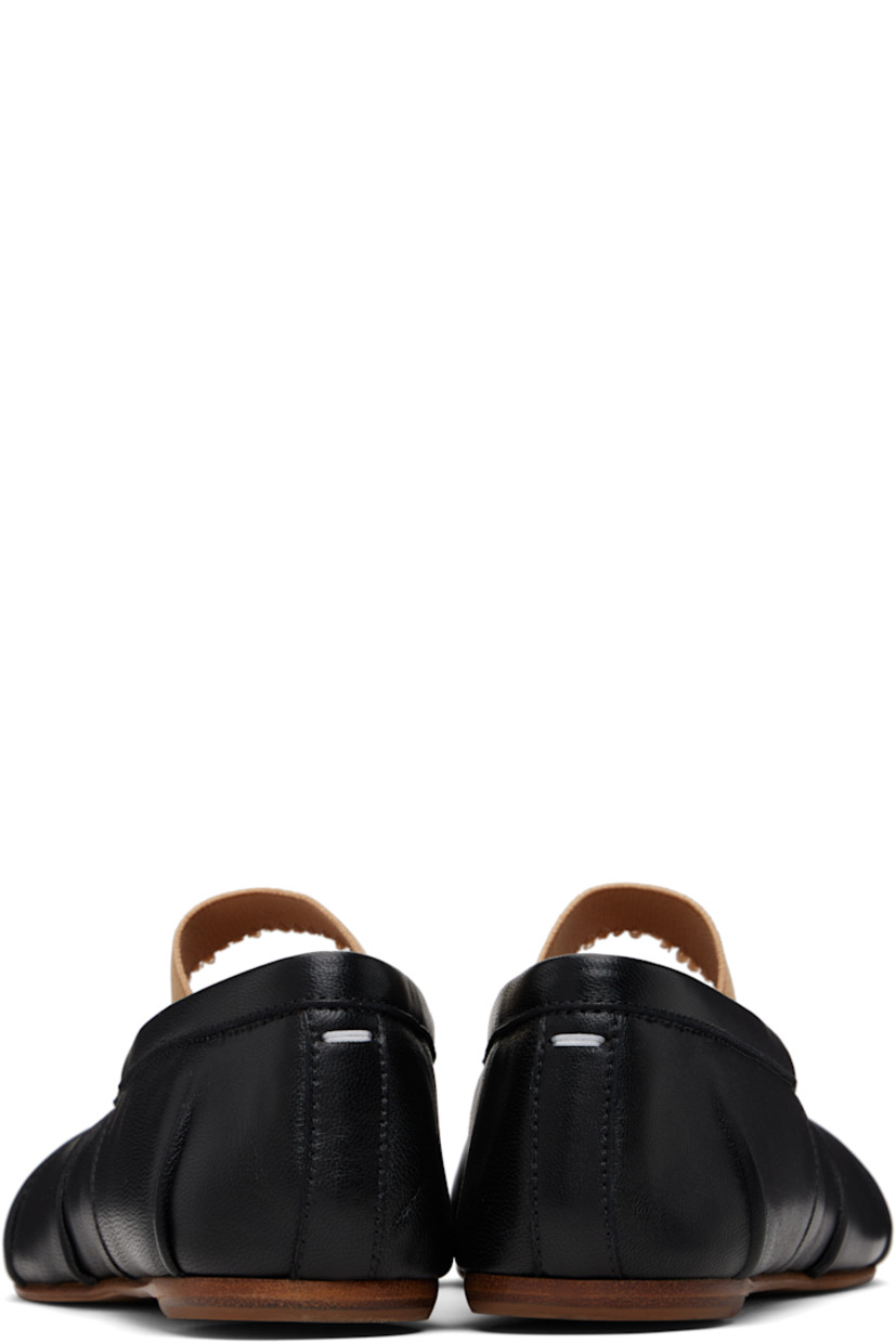 Buffed lambskin ballerina flats.

· Square cleft toe
· Knot and elasticized strap at vamp
· Pinched seams at sides
· White stitching at heel collar
· Calfskin sole with rubber injection

Supplier color: Black/Nude
