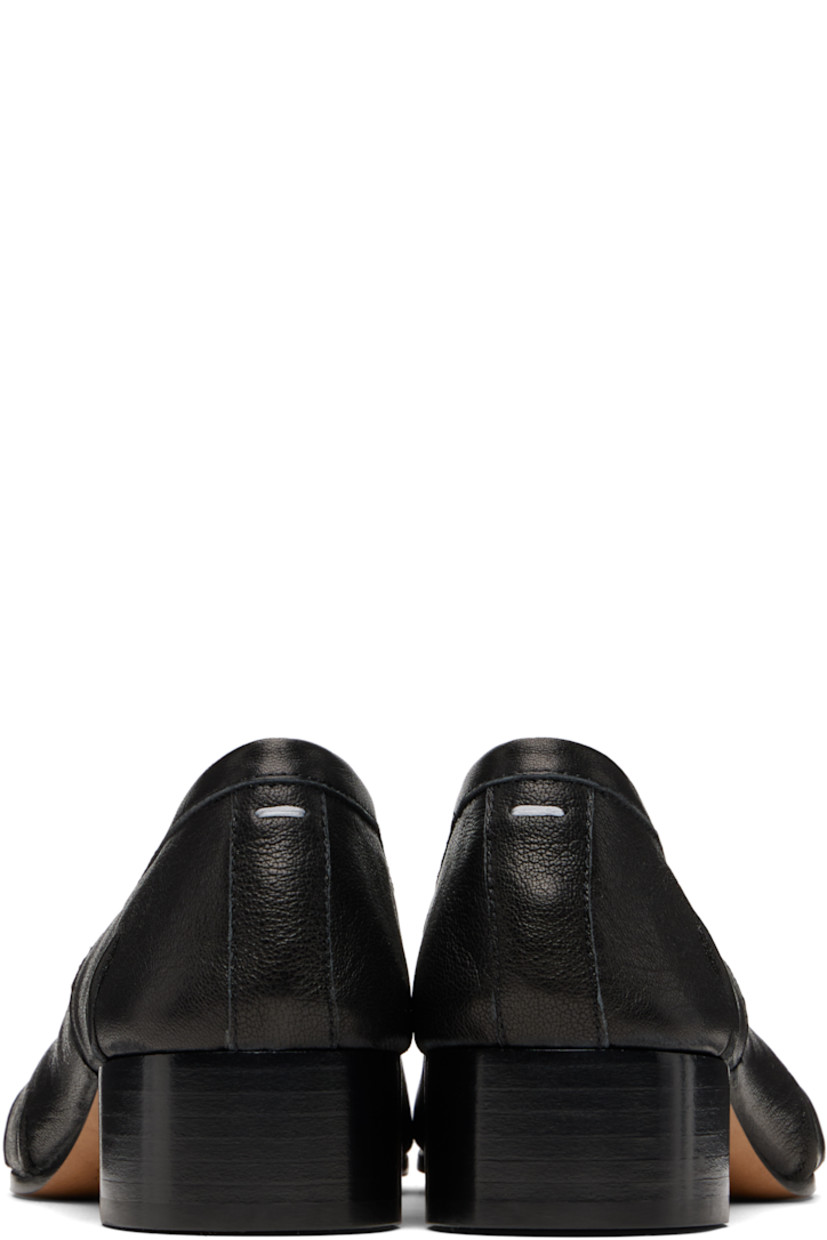 Grained lambskin heels.

· Square cleft toe
· Knotted accent at vamp
· Gathering at sides
· Signature white stitch at heel collar
· Buffed calfskin lining
· Stacked calfskin heel with rubber injection
· Smooth calfskin sole
· Heel: H1.25"

Supplier color: Black