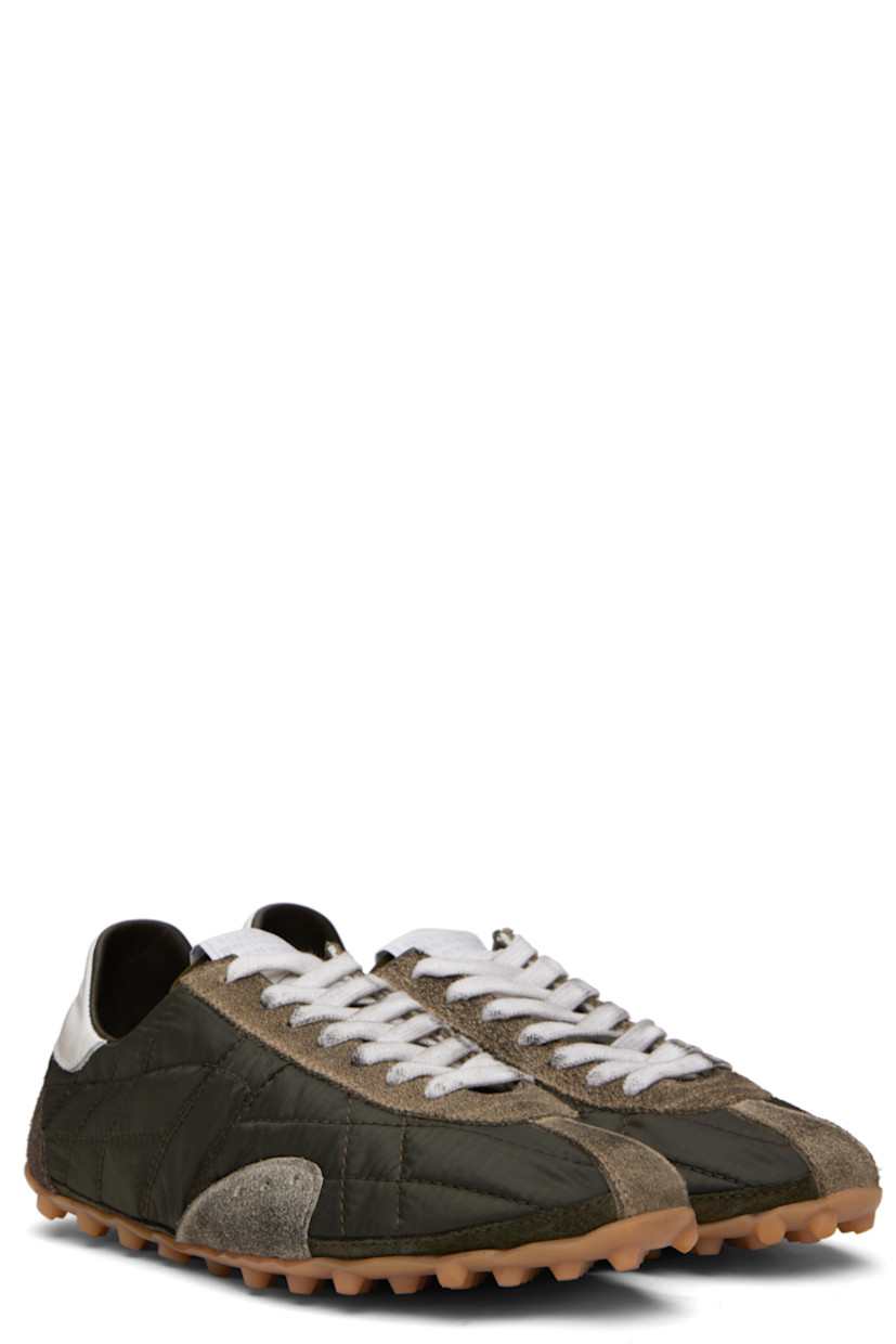 Low-top quilted taffeta and calfskin suede sneakers.

· Lace-up closure
· Logo patch at tongue
· White stitching at heel tab
· Twill lining
· Treaded rubber sole
 
Supplier color: Dark green/White