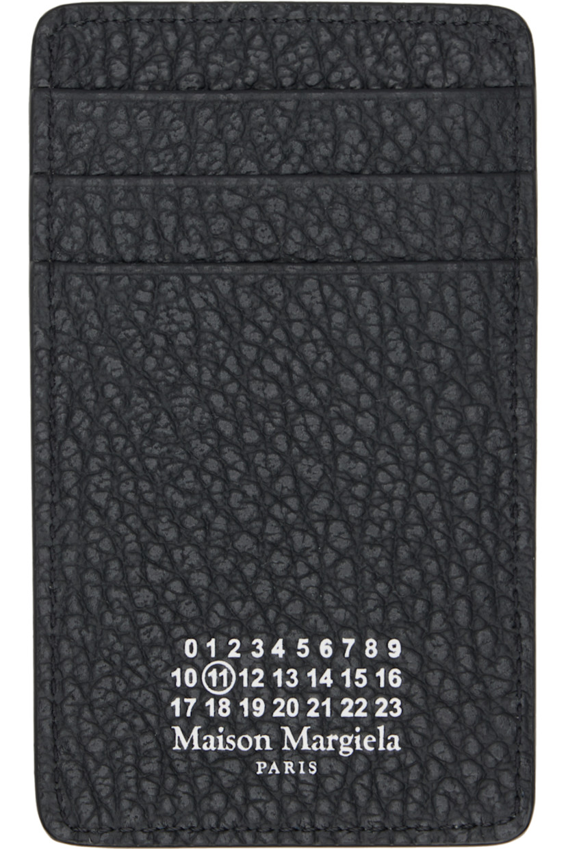 Pebble-grained calfskin card holder. 

· Logo printed at face
· Six card slots
· White stitching at back face
· Canvas lining 
· H4.75" x W2.75"

Supplier color: Black