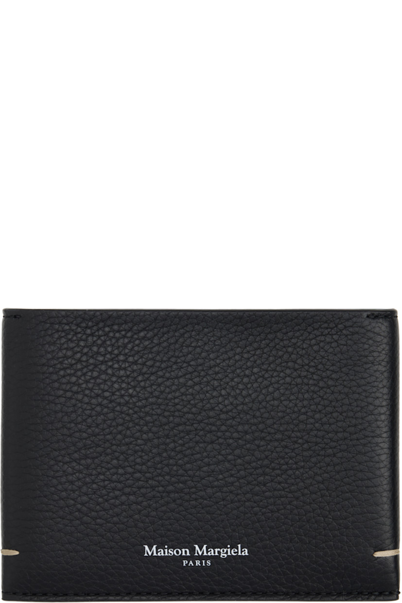 Grained calfskin bifold wallet.

· White stitching at face and back face
· Logo printed at face
· Two patch pockets
· Six card slots
· H3.5" x W4.75" x D1"

Supplier color: Black/Black/Black