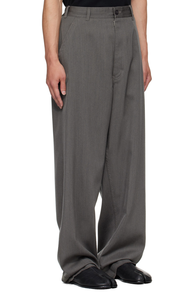 Virgin wool gabardine trousers.

· Belt loops
· Button tabs at waistband 
· Four-pocket styling
· Zip fly 
· Webbing trim at cuffs
· White stitching at back waist

Supplier color: Slate
