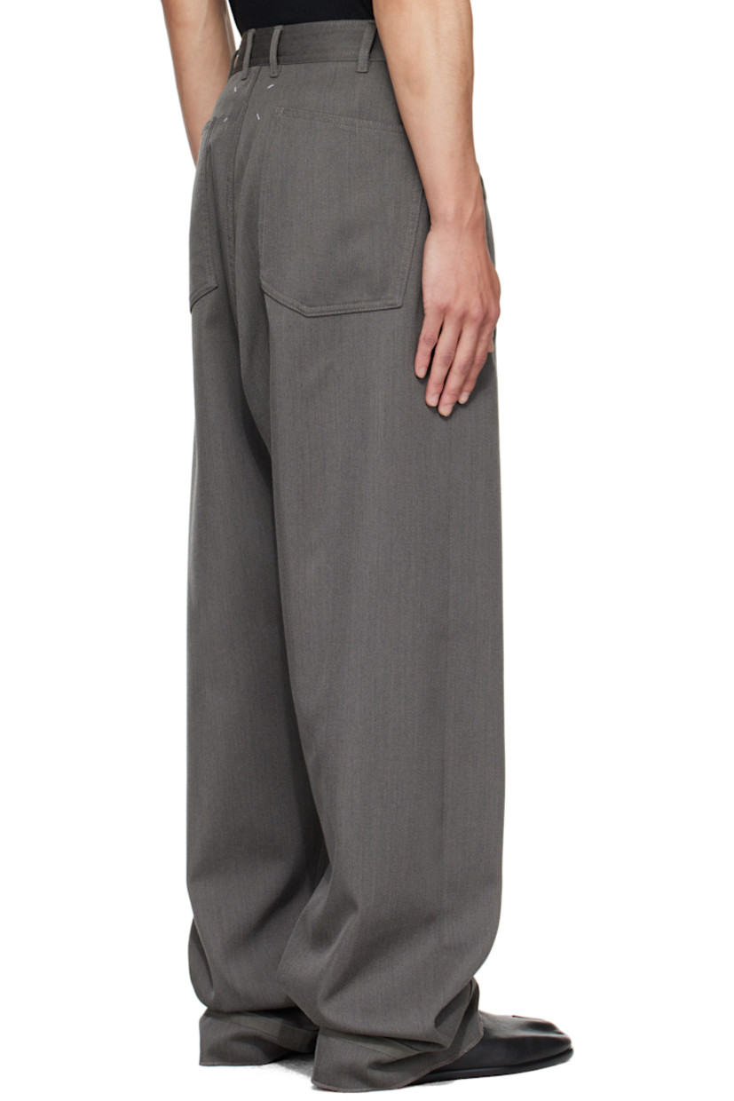 Virgin wool gabardine trousers.

· Belt loops
· Button tabs at waistband 
· Four-pocket styling
· Zip fly 
· Webbing trim at cuffs
· White stitching at back waist

Supplier color: Slate