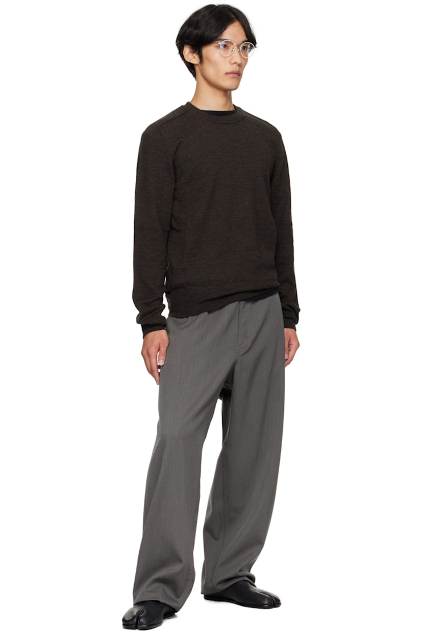 Virgin wool gabardine trousers.

· Belt loops
· Button tabs at waistband 
· Four-pocket styling
· Zip fly 
· Webbing trim at cuffs
· White stitching at back waist

Supplier color: Slate