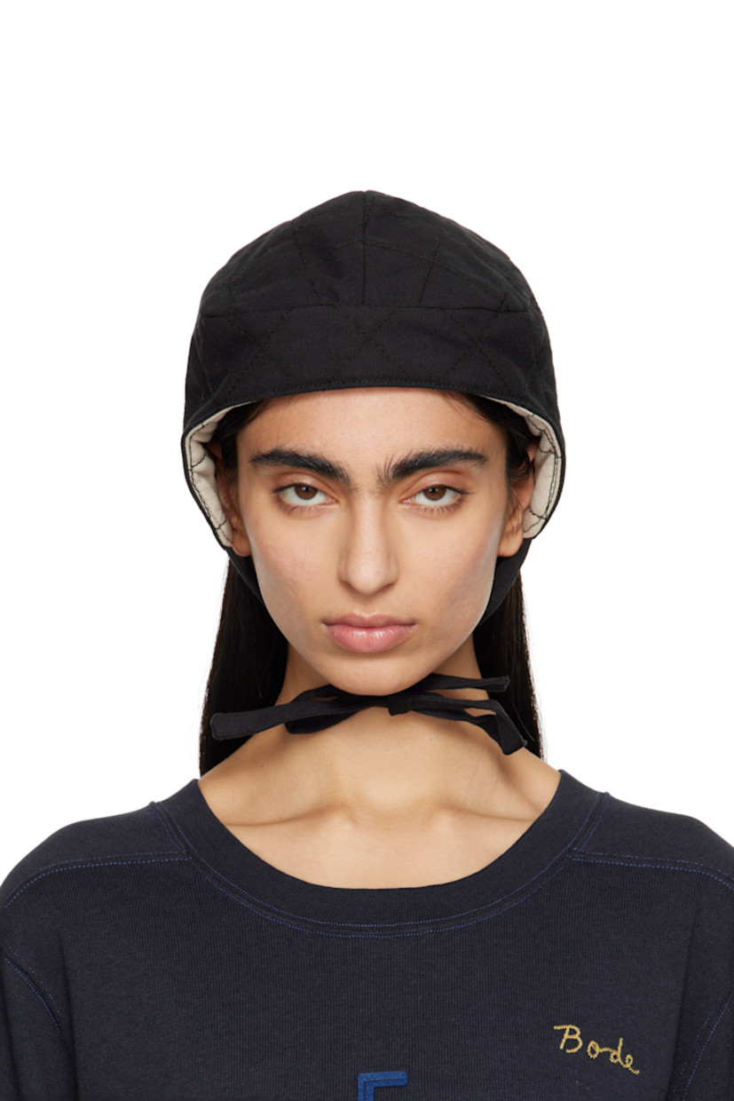 Padded and quilted cotton canvas cap in black.

· Self-tie chin strap
· Quilted twill lining

This item is part of a limited run of 22.

Supplier color: Black/Yellow